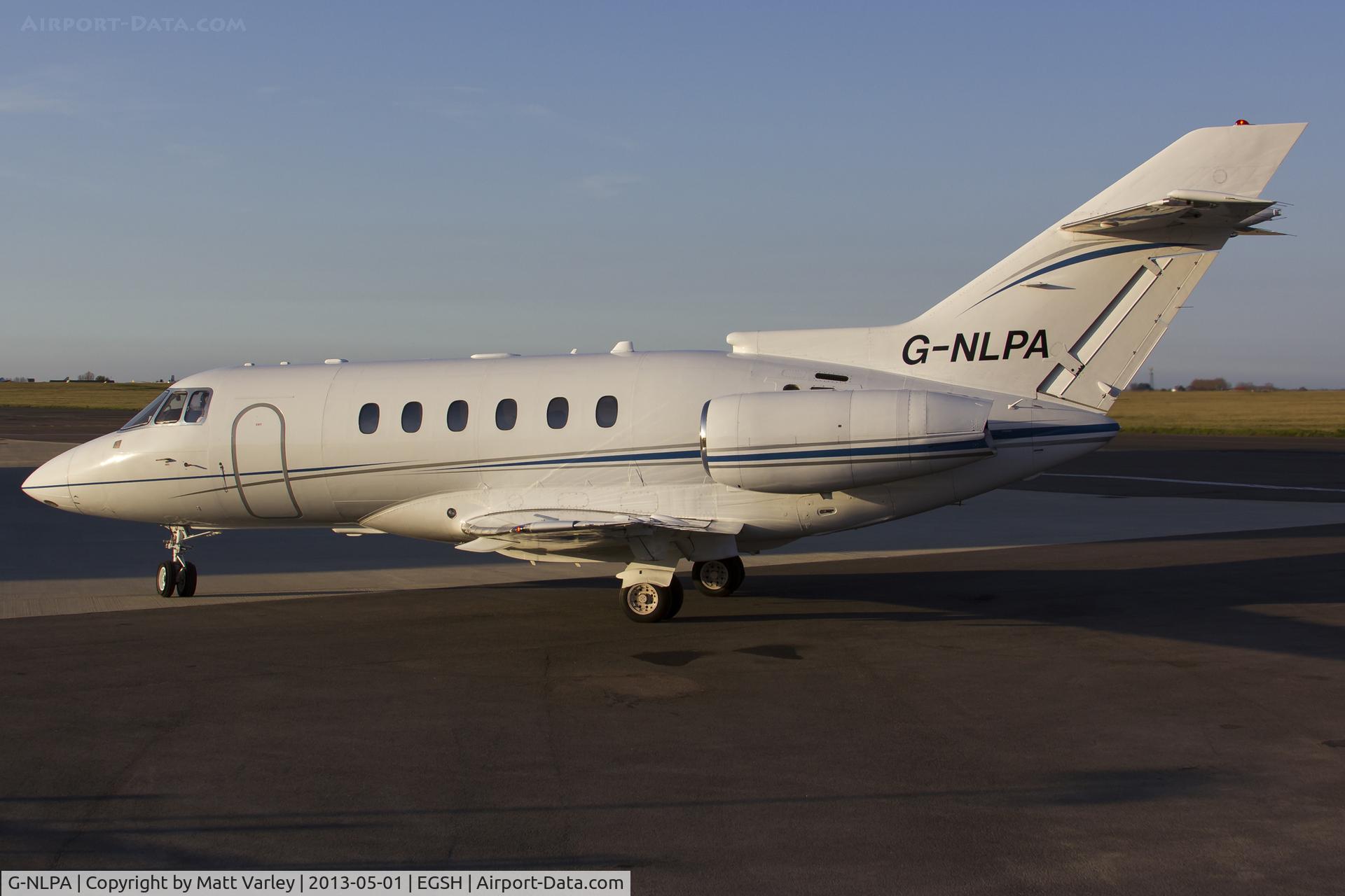 G-NLPA, 2008 Hawker 750 C/N HB-14, Arriving at SaxonAir in the setting sun.