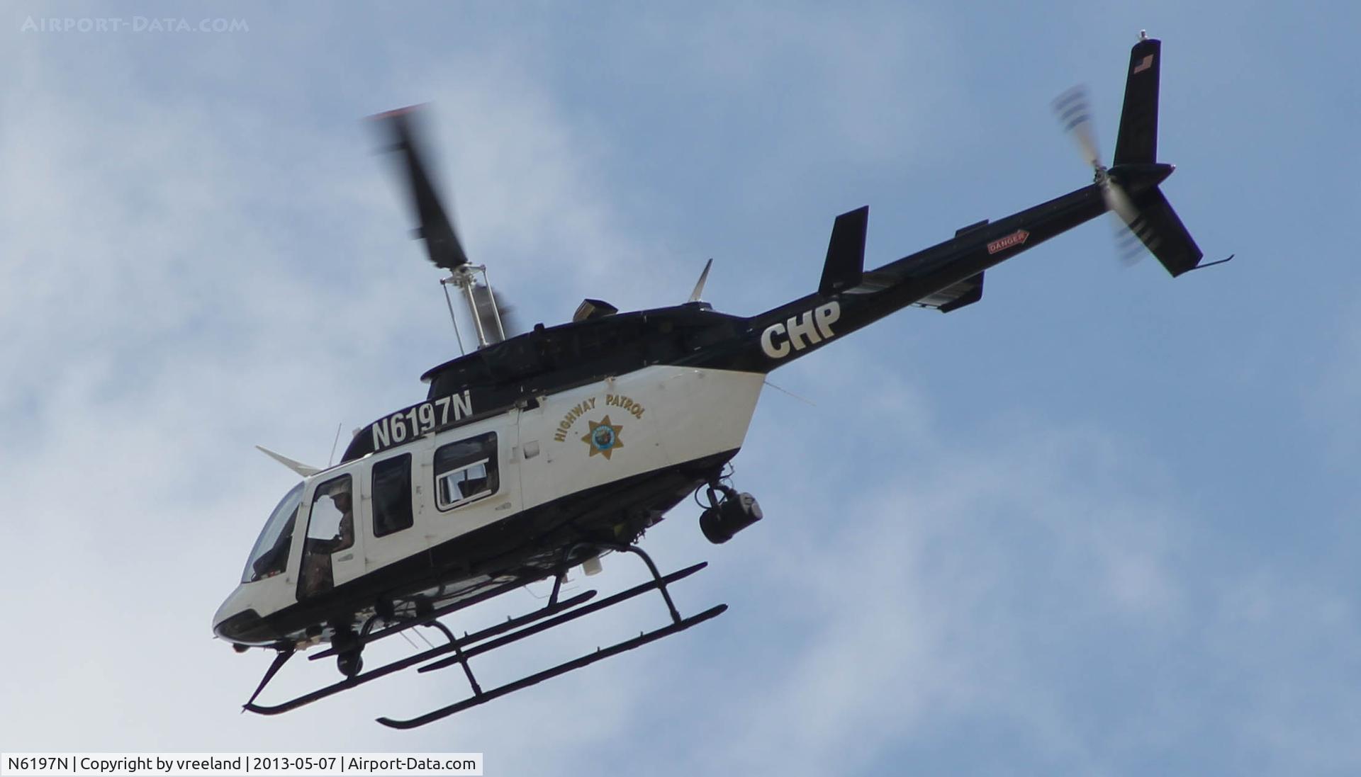 N6197N, 1993 Bell 206L-4 LongRanger IV LongRanger C/N 52014, Flying high above the 91/57 interchange in Southern California.