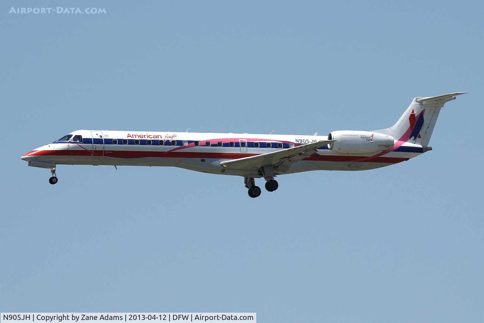 N905JH, 2005 Embraer ERJ-145LR (EMB-145LR) C/N 14500892, American Eagle landing at DFW Airport Komen Race for the Cure paint.