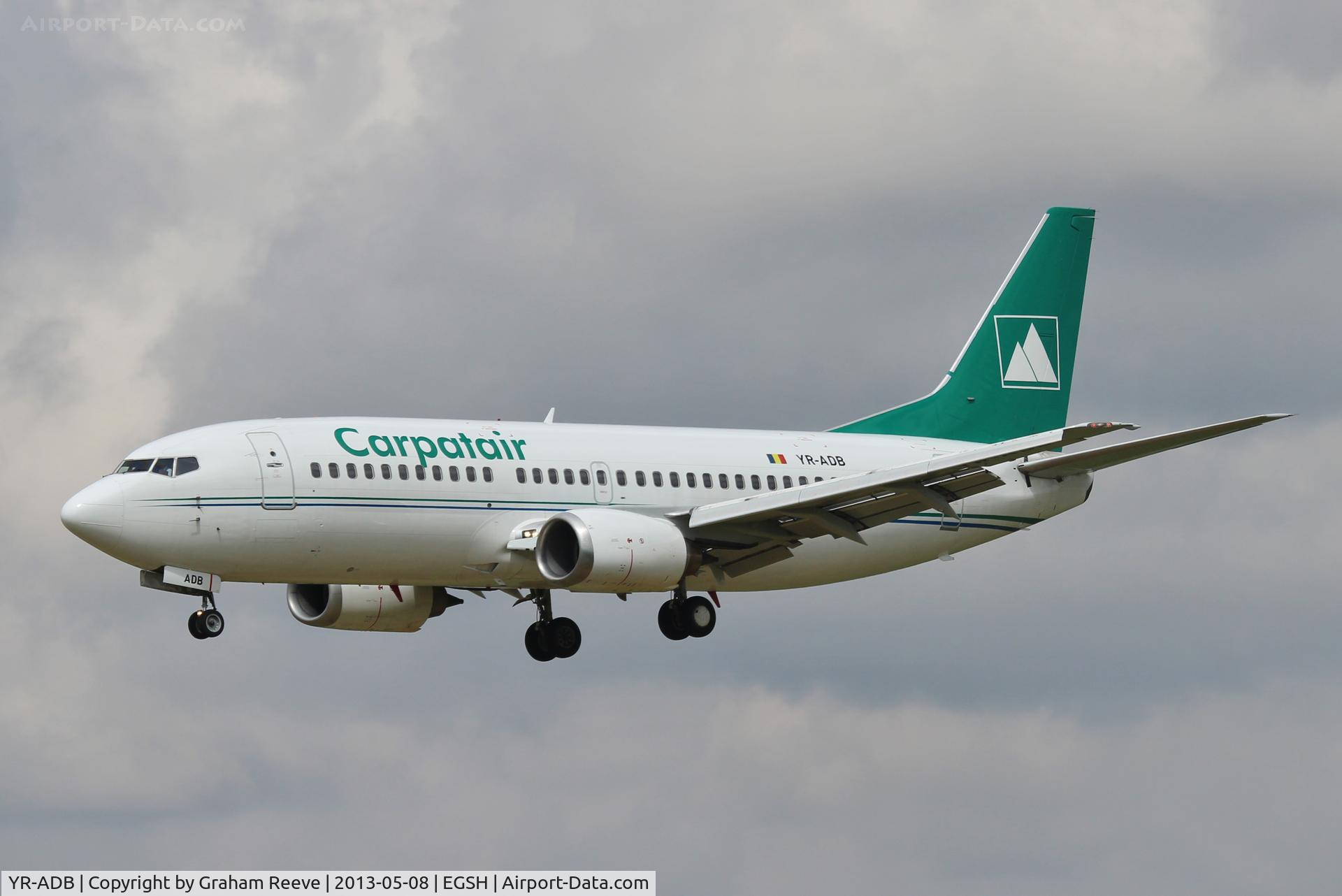 YR-ADB, 1997 Boeing 737-31S C/N 29058, About to touch down at Norwich.