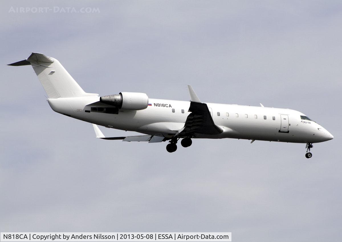 N818CA, 2000 Bombardier CRJ-100ER (CL-600-2B19) C/N 7408, On final for runway 19L.