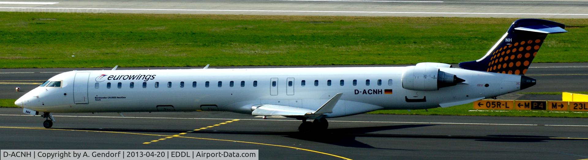D-ACNH, 2009 Bombardier CRJ-900 NG (CL-600-2D24) C/N 15247, Eurowings (LH-Regional cs.), is here on taxiway M at Düsseldorf Int´l (EDDL)