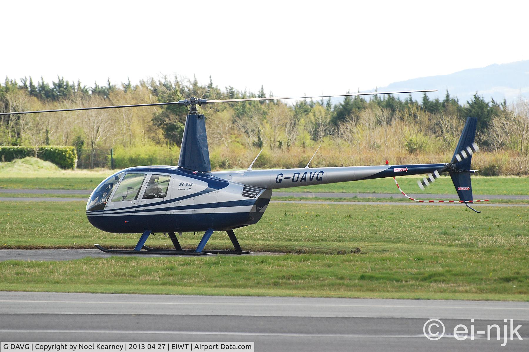 G-DAVG, 2003 Robinson R44 Raven II C/N 10038, Dropping in for fuel at Weston.