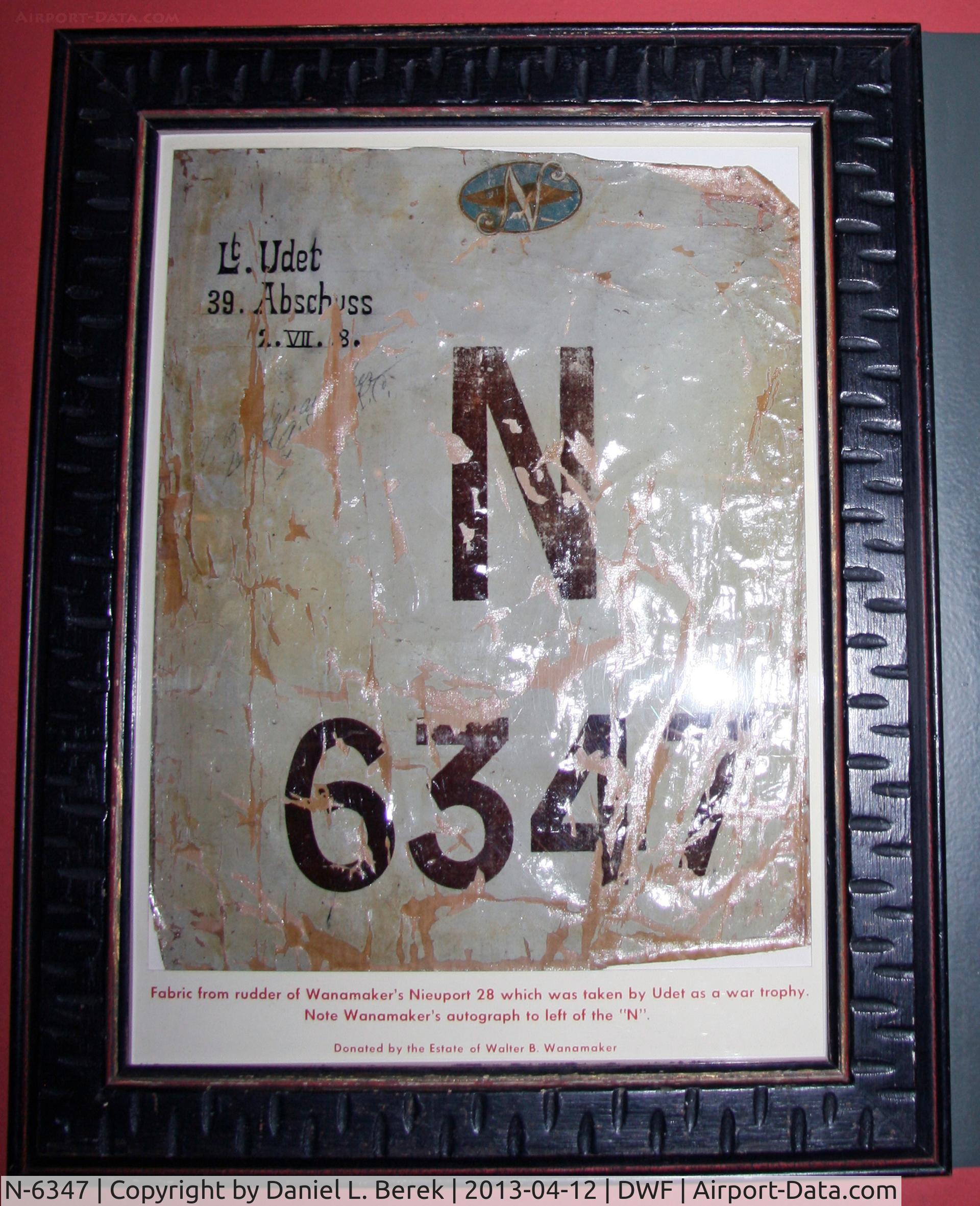 N-6347, Nieuport 28 C/N Not found N-6347, The German pilot who shot down John Wannamaker's Nieuport 28 took this fabric fragment with the plane's serial number as a war trophy.  Wannamaker retrieved the artifact and donated it to the National Museum of the Air Force.