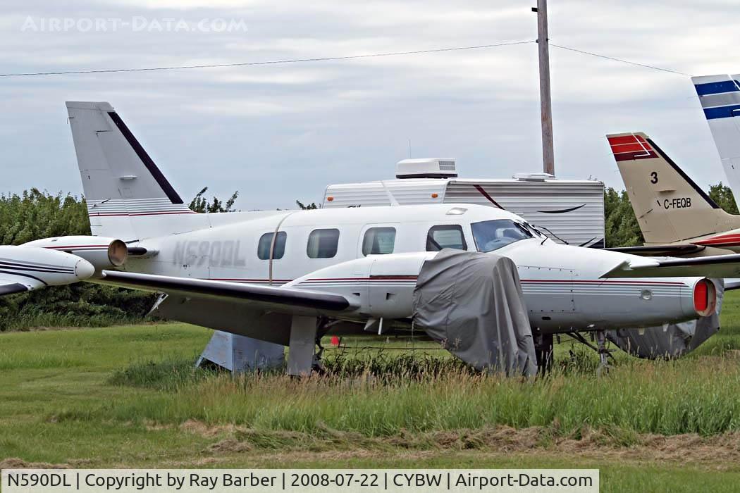 N590DL, 1975 Piper PA-31T C/N 31T-7520031, Piper PA-31T Cheyenne II [31T-7520031] (Rocky Mountain Aircraft) Calgary-Springbank~C 22/07/2008. Stored registration removed.