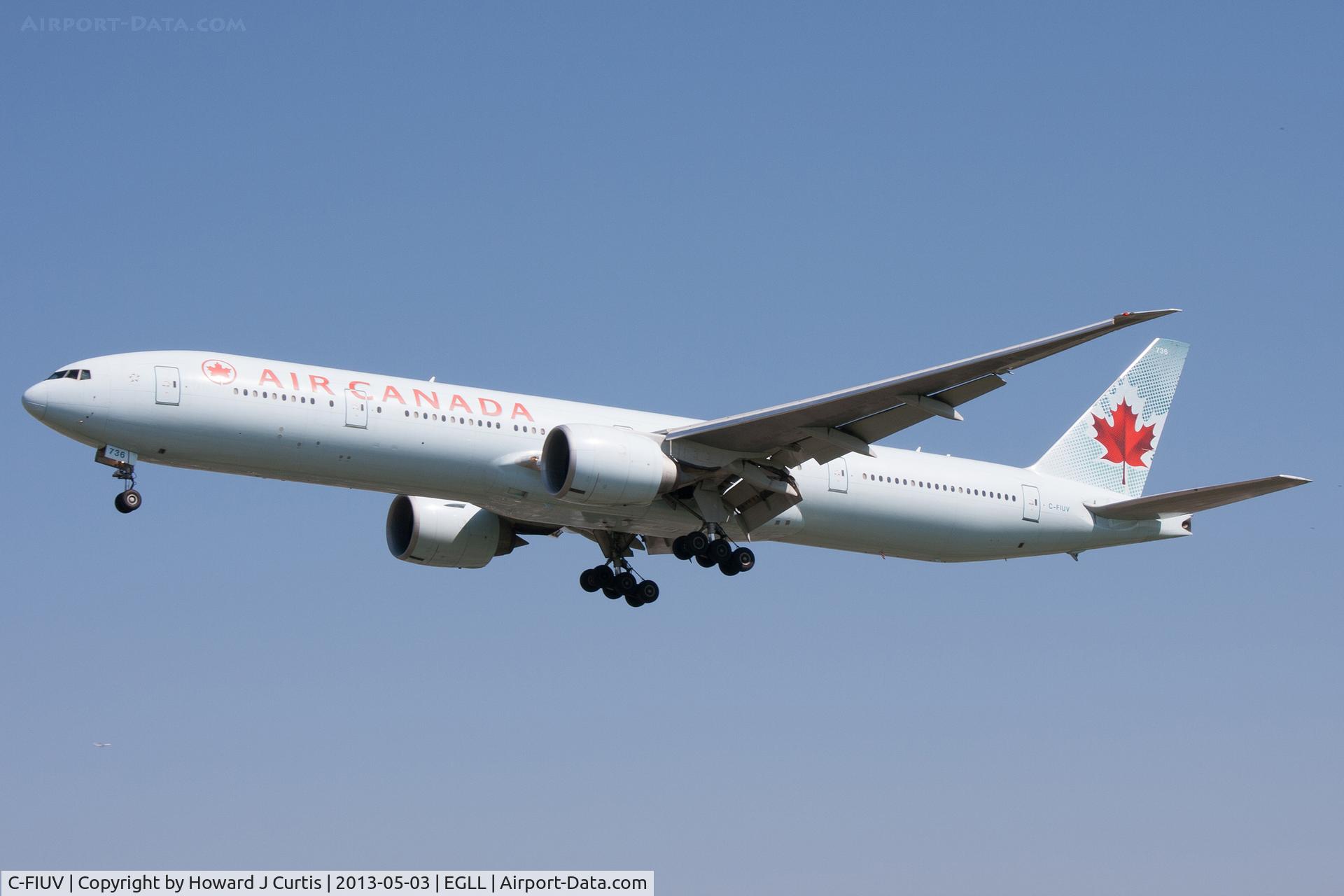C-FIUV, 2008 Boeing 777-333/ER C/N 35248, Air Canada, on approach to runway 27L.