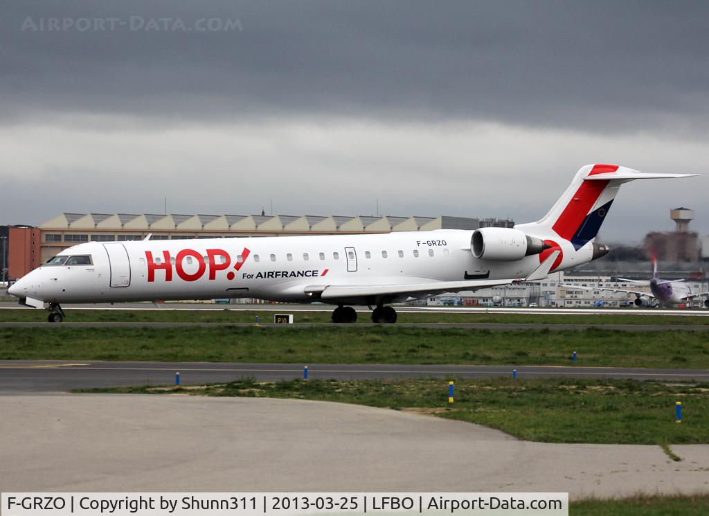 F-GRZO, 2007 Canadair CRJ-700 (CL-600-2C10) Regional Jet C/N 10265, Taxiing holding point rwy 32R for departure...