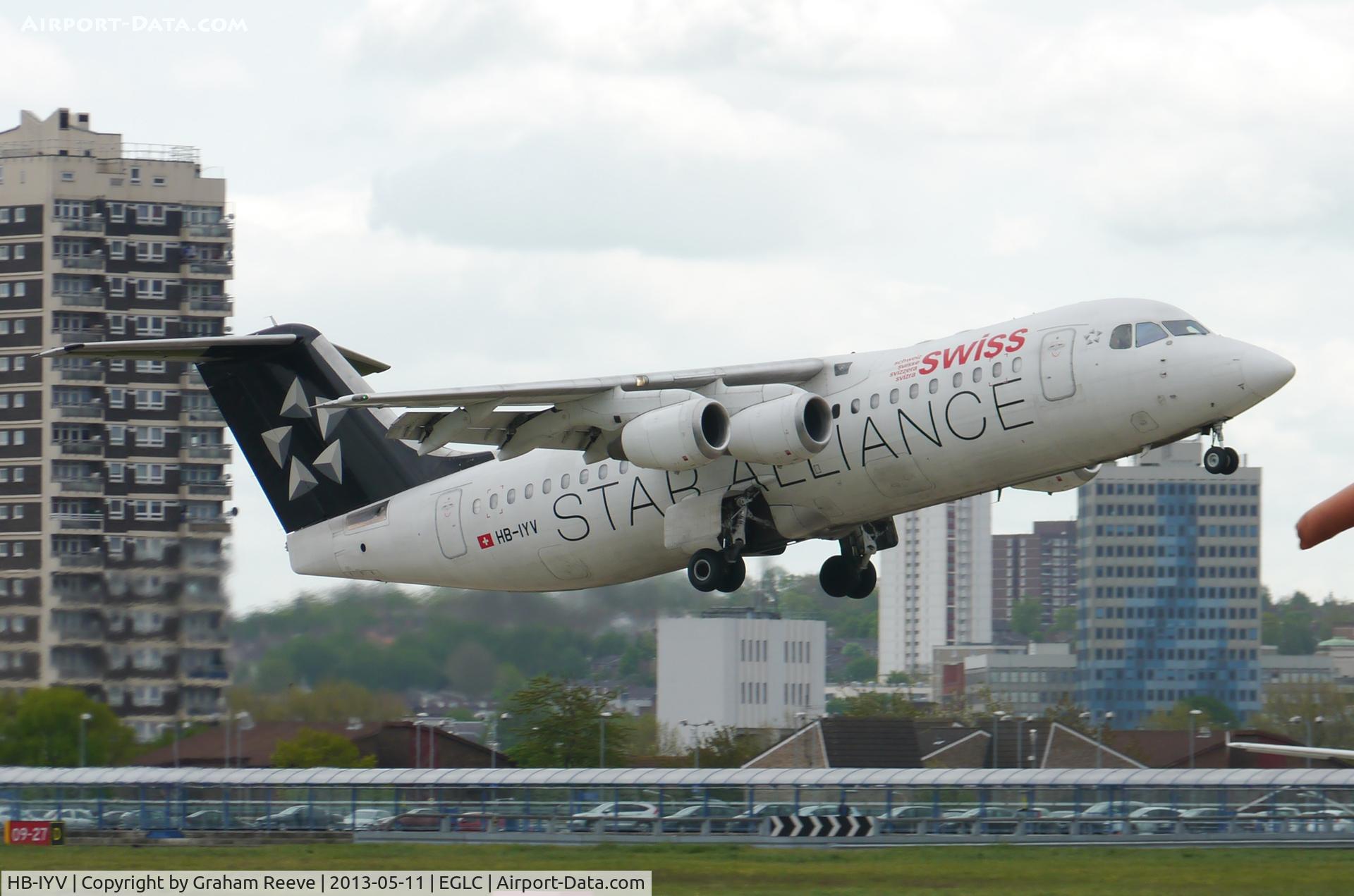 HB-IYV, 2000 British Aerospace Avro 146-RJ100 C/N E3377, Departing from London City airport.