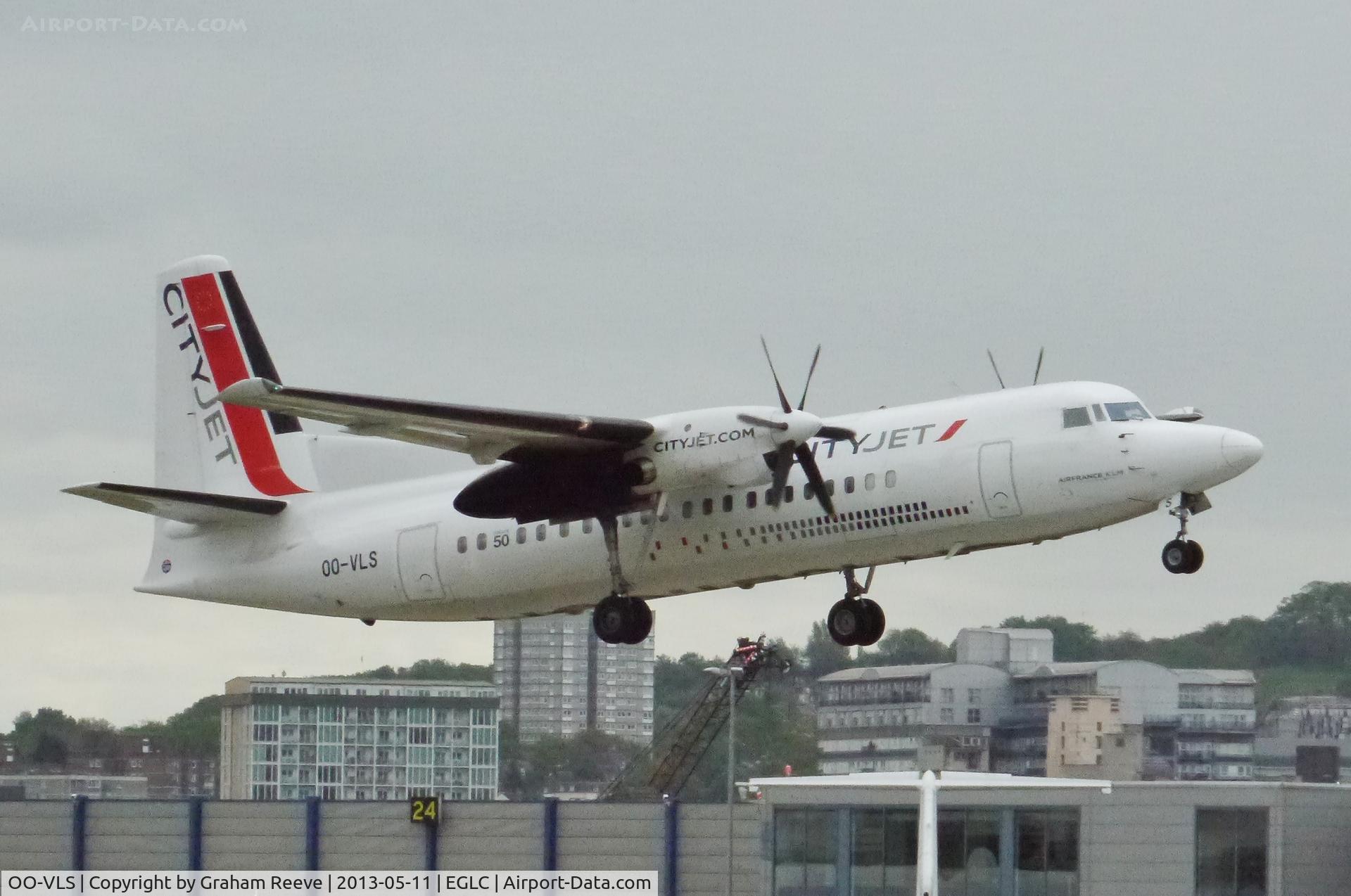 OO-VLS, 1987 Fokker 50 C/N 20109, Departing on a cold and wet May day.