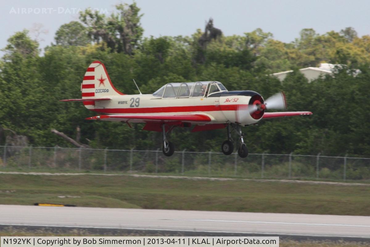 N192YK, 1990 Yakovlev Yak-52 C/N 9011008, Landing on RWY 9R at Sun N Fun 2013 - Lakeland, FL