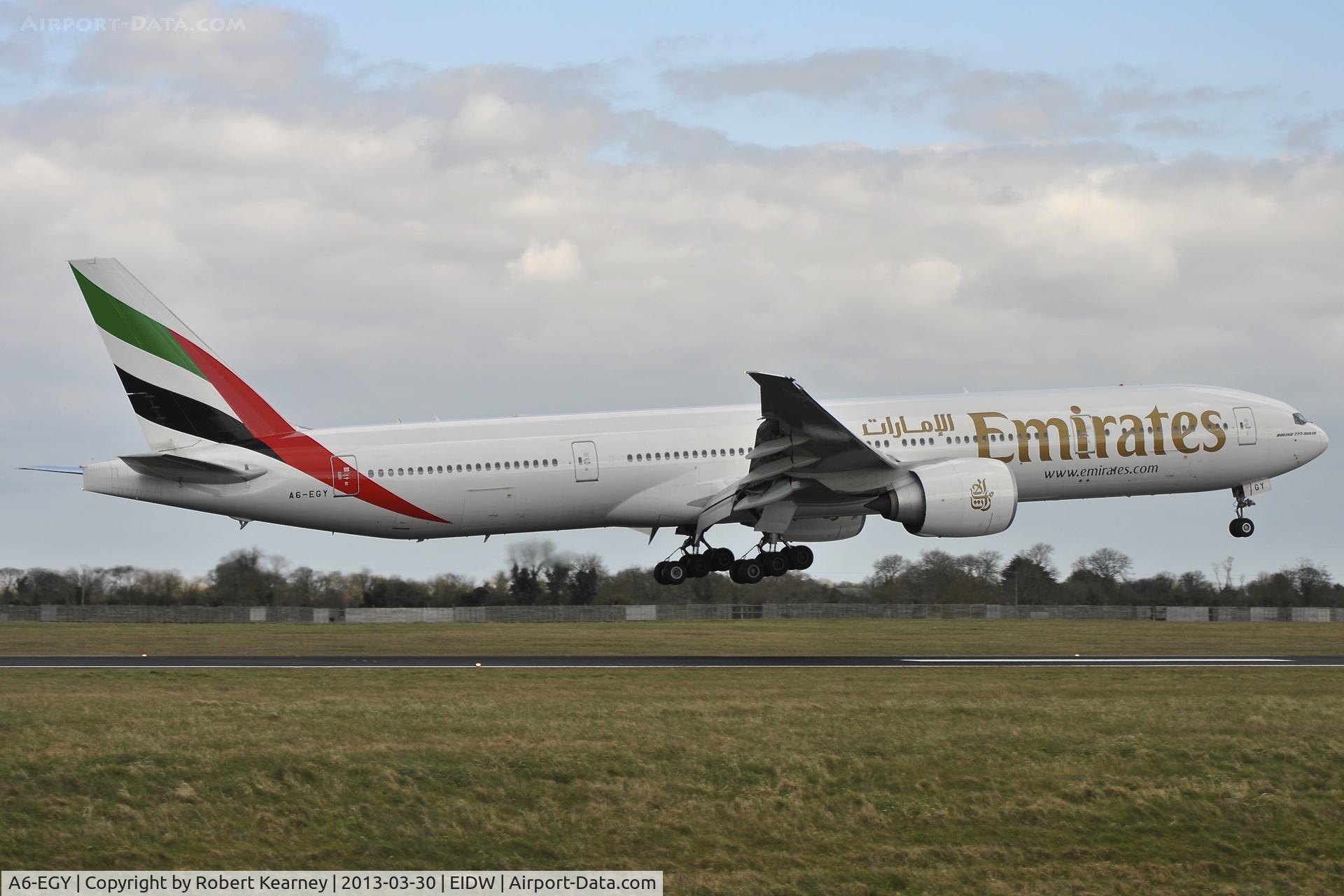 A6-EGY, 2012 Boeing 777-31H/ER C/N 41080, About to touch down on r/w 10