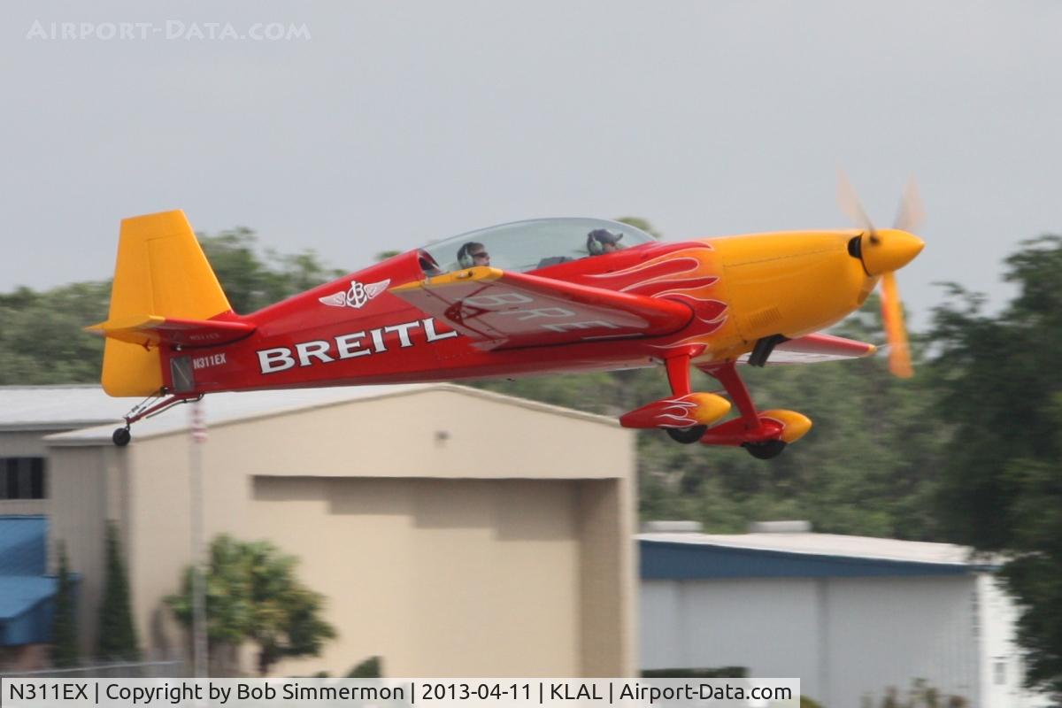 N311EX, 1997 Extra EA-300/L C/N 056, Landing at Sun N Fun 2013 - Lakeland, FL