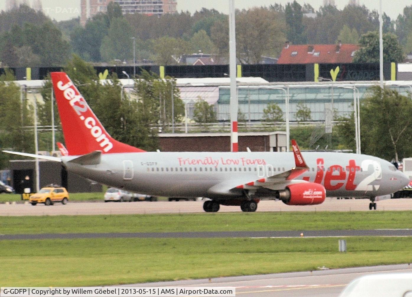 G-GDFP, 1998 Boeing 737-8Z9 C/N 28177, Taxi to the parking on Schiphol east.