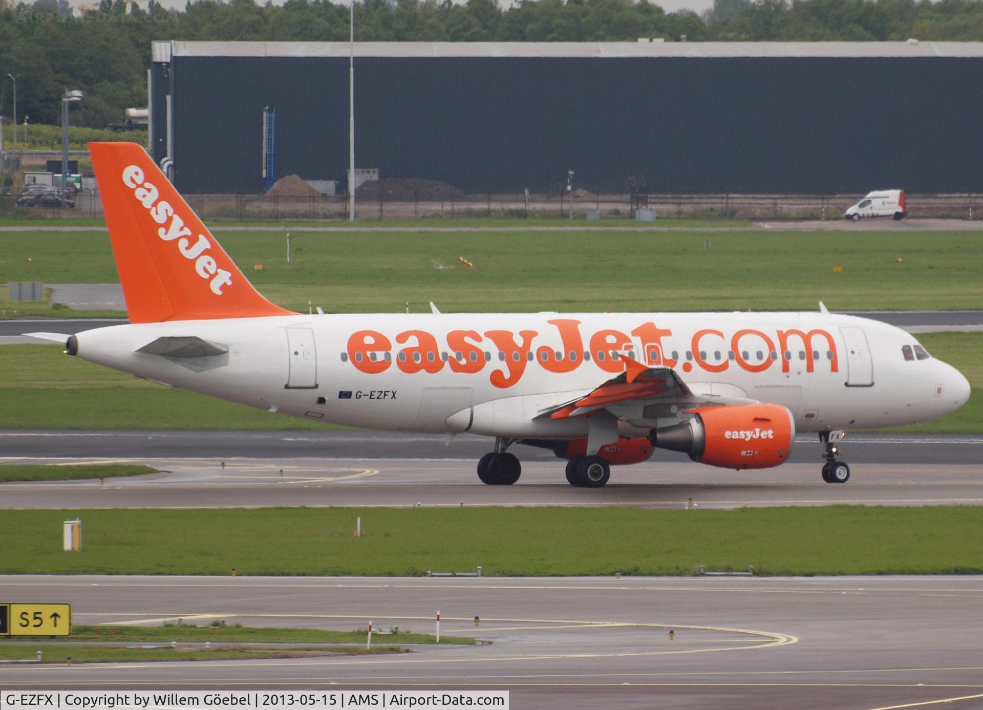 G-EZFX, 2010 Airbus A319-111 C/N 4385, Taxi to runway 24 on Schiphol Airport for take off.