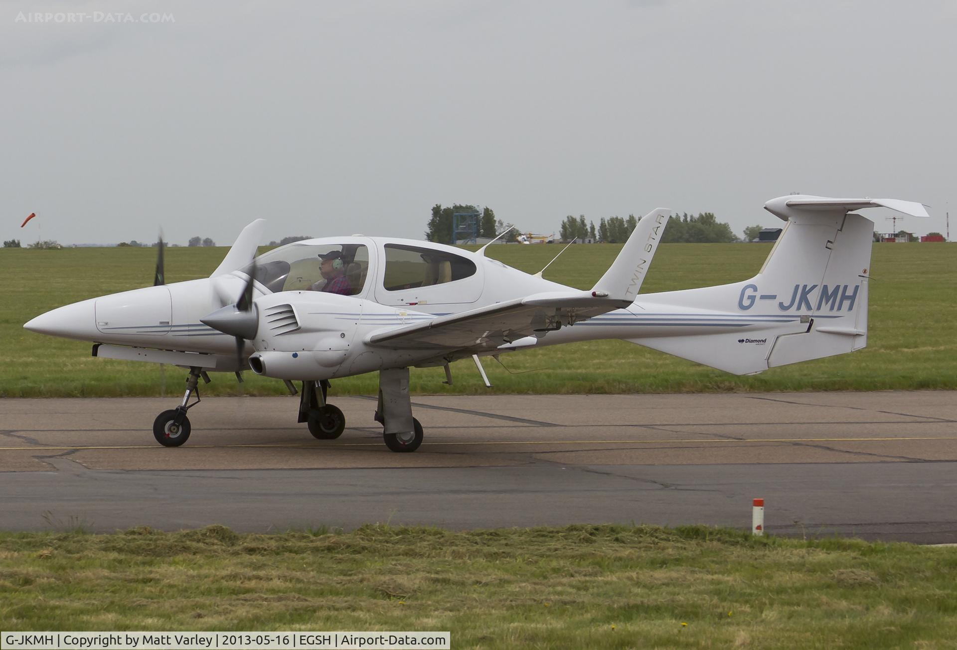 G-JKMH, 2006 Diamond DA-42 Twin Star C/N 42.168, Arriving at SaxonAir.