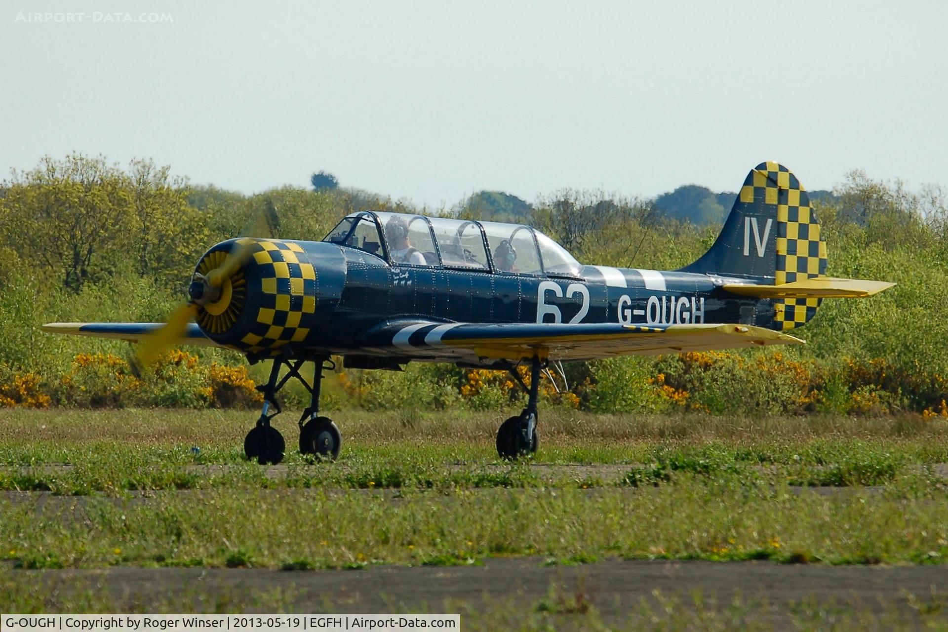 G-OUGH, 1987 Bacau Yak-52 C/N 877404, Resident Yak-52. Marked 74/JA on starboard fuselage/fin.