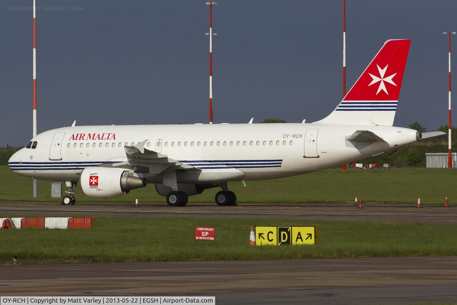OY-RCH, 2004 Airbus A319-112 C/N 2186, Sat on stand after arriving for spray into Atlantic Airlines C/S...