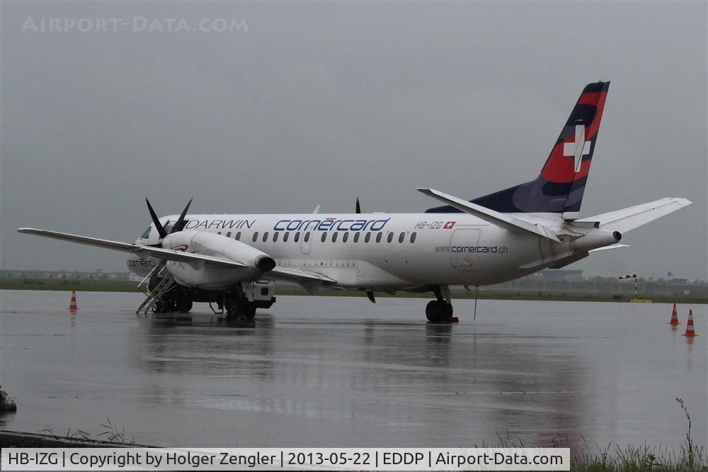 HB-IZG, 1995 Saab 2000 C/N 2000-010, Plane in rain (lyric poetry against bad weather)...