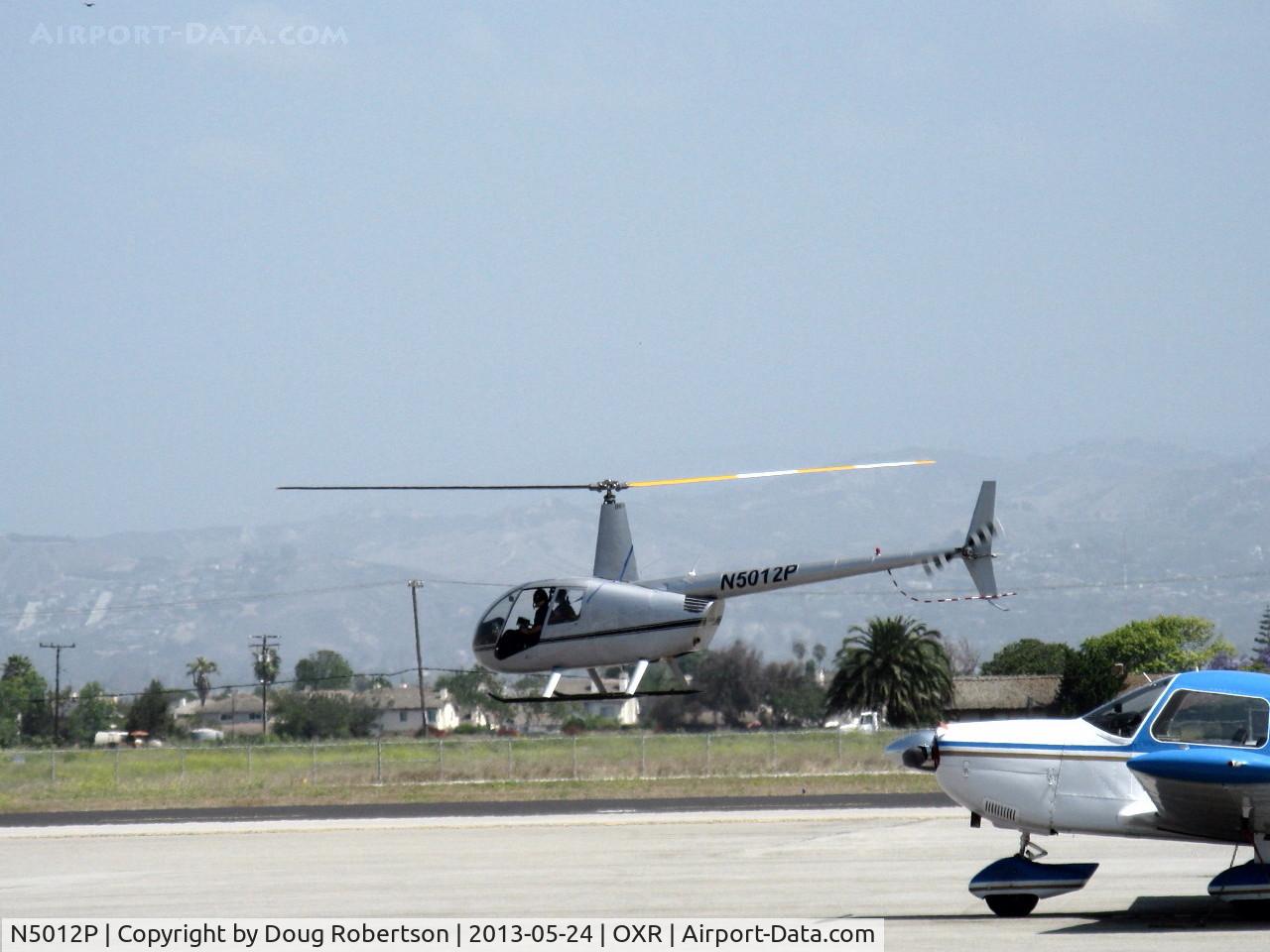 N5012P, 2005 Robinson R44 II C/N 10740, 2005 Robinson R44 RAVEN II, Lycoming IO-540 derated to 245 Hp for 5 minutes, 205 Hp continuous, warmup hover awaiting ATC clearance