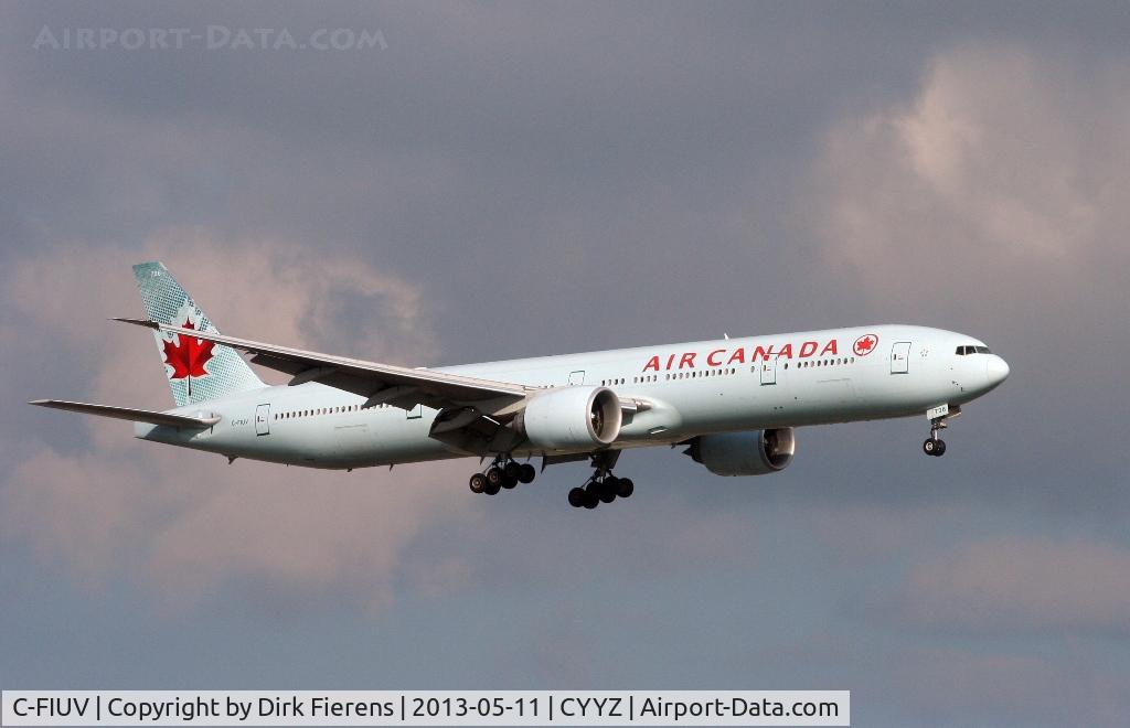 C-FIUV, 2008 Boeing 777-333/ER C/N 35248, Landing in the early evening.