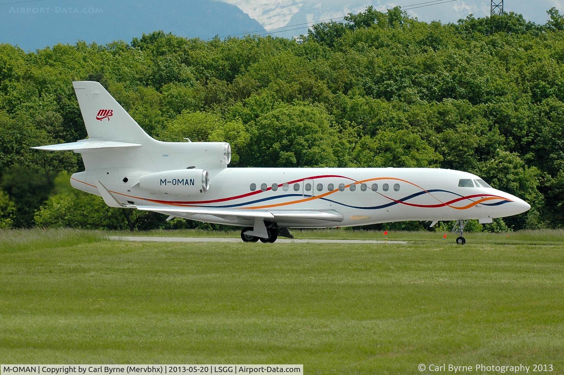 M-OMAN, 2011 Dassault Falcon 7X C/N 138, Taken from the park at the 05 threshold.