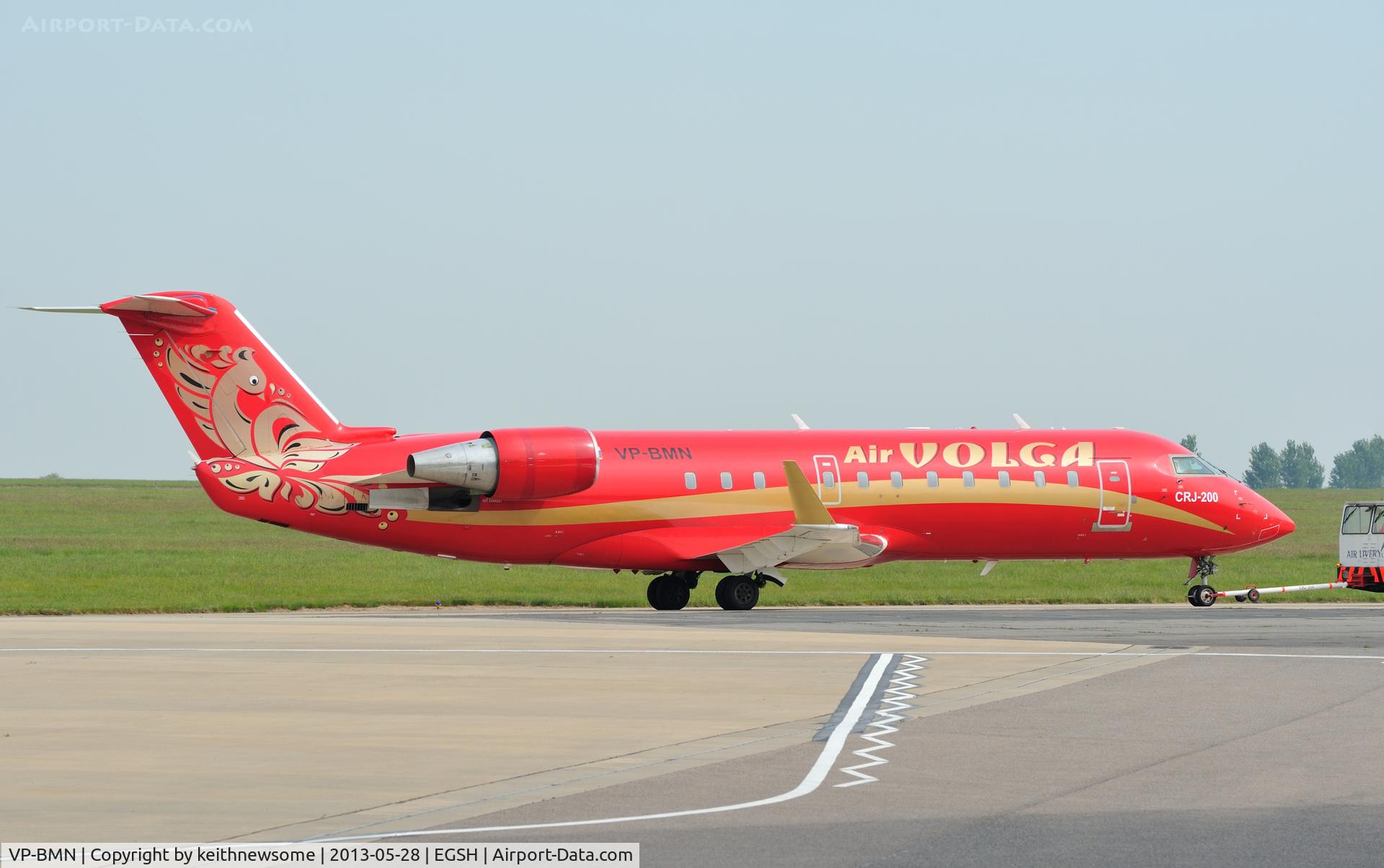 VP-BMN, 1997 Canadair CRJ-200ER (CL-600-2B19) C/N 7179, Being towed to spray shop.