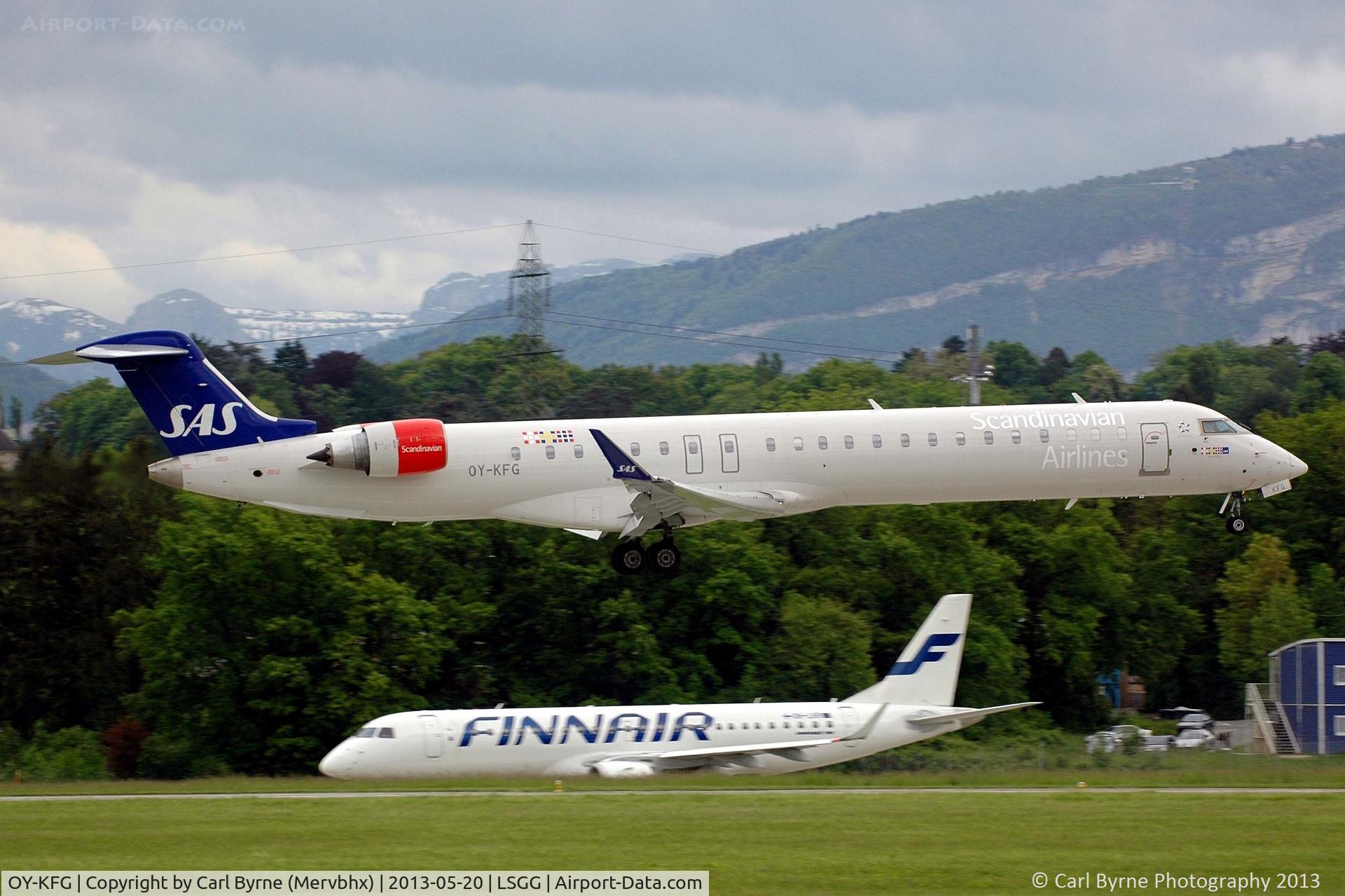 OY-KFG, 2009 Bombardier CRJ-900ER (CL-600-2D24) C/N 15237, Taken from the park at the 05 threshold.