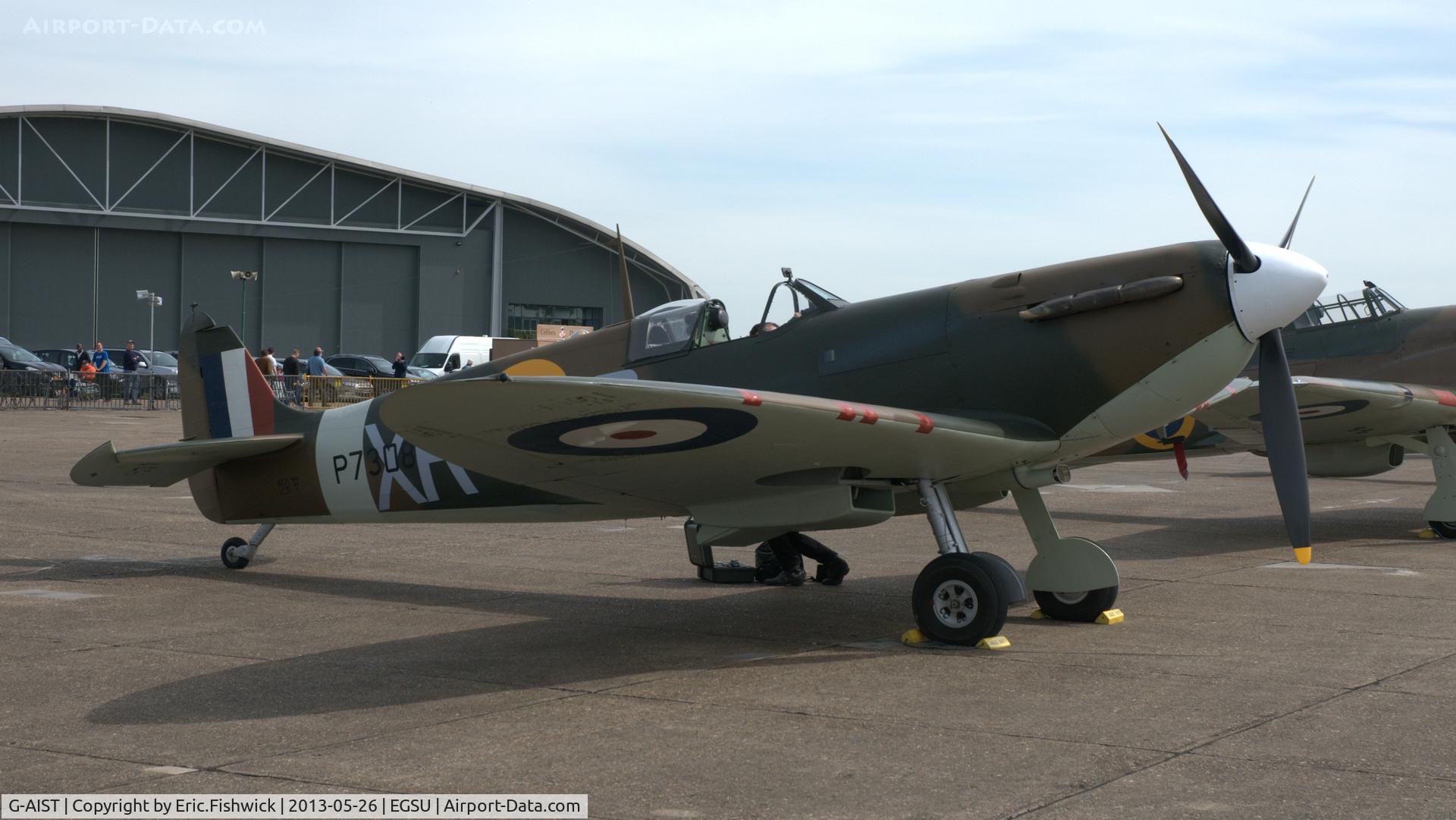G-AIST, 1941 Supermarine 300 Spitfire Mk1A C/N WASP/20/2, 2. AR213 now in the guise of P7308 and a member of the Eagle Squadron on the flightline at the IWM Spring Airshow, May 2013.