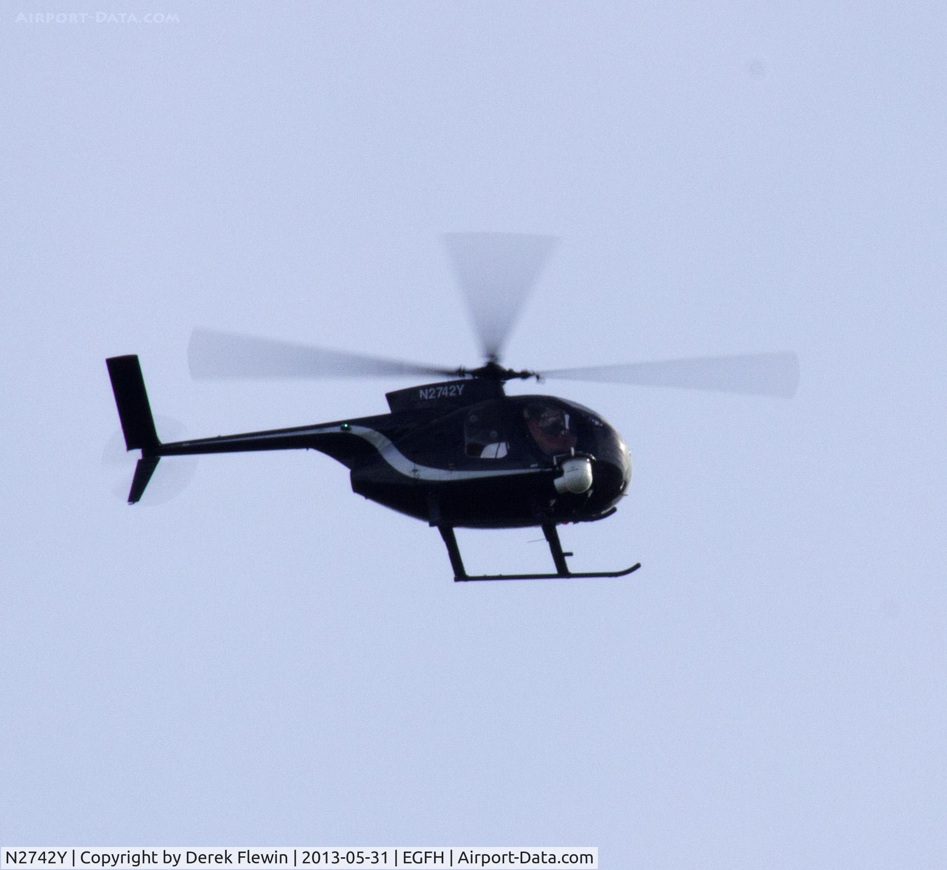 N2742Y, Hughes 369HS C/N 620389S, Requested to overfly EGFH ATZ from the North at 3000'.