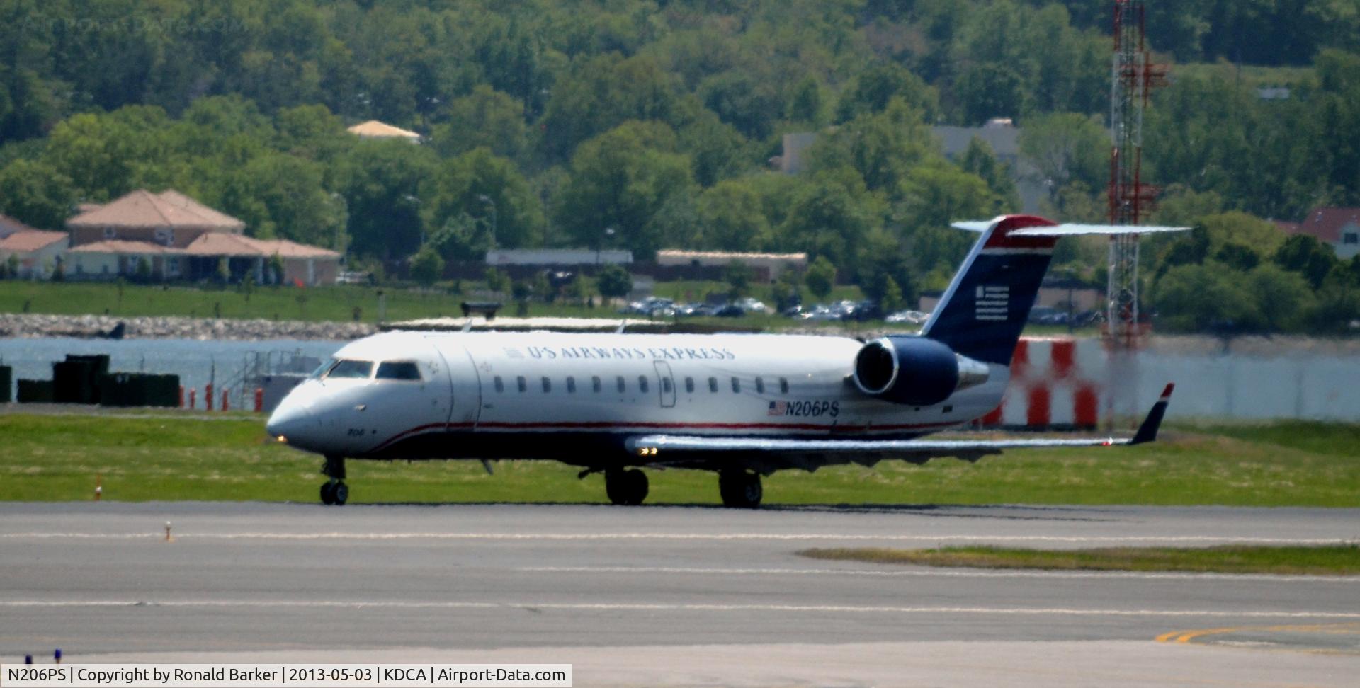 N206PS, 2003 Bombardier CRJ-200ER (CL-600-2B19) C/N 7860, Takeoff DCA