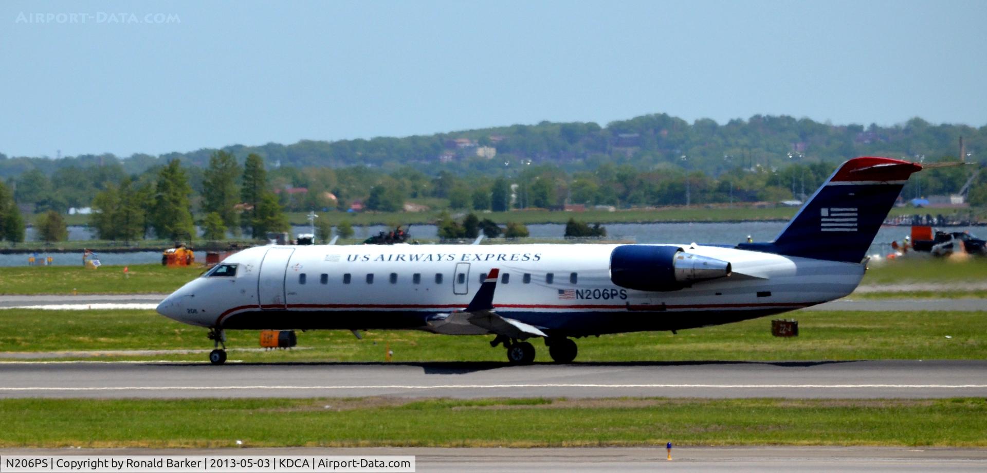 N206PS, 2003 Bombardier CRJ-200ER (CL-600-2B19) C/N 7860, Takeoff DCA