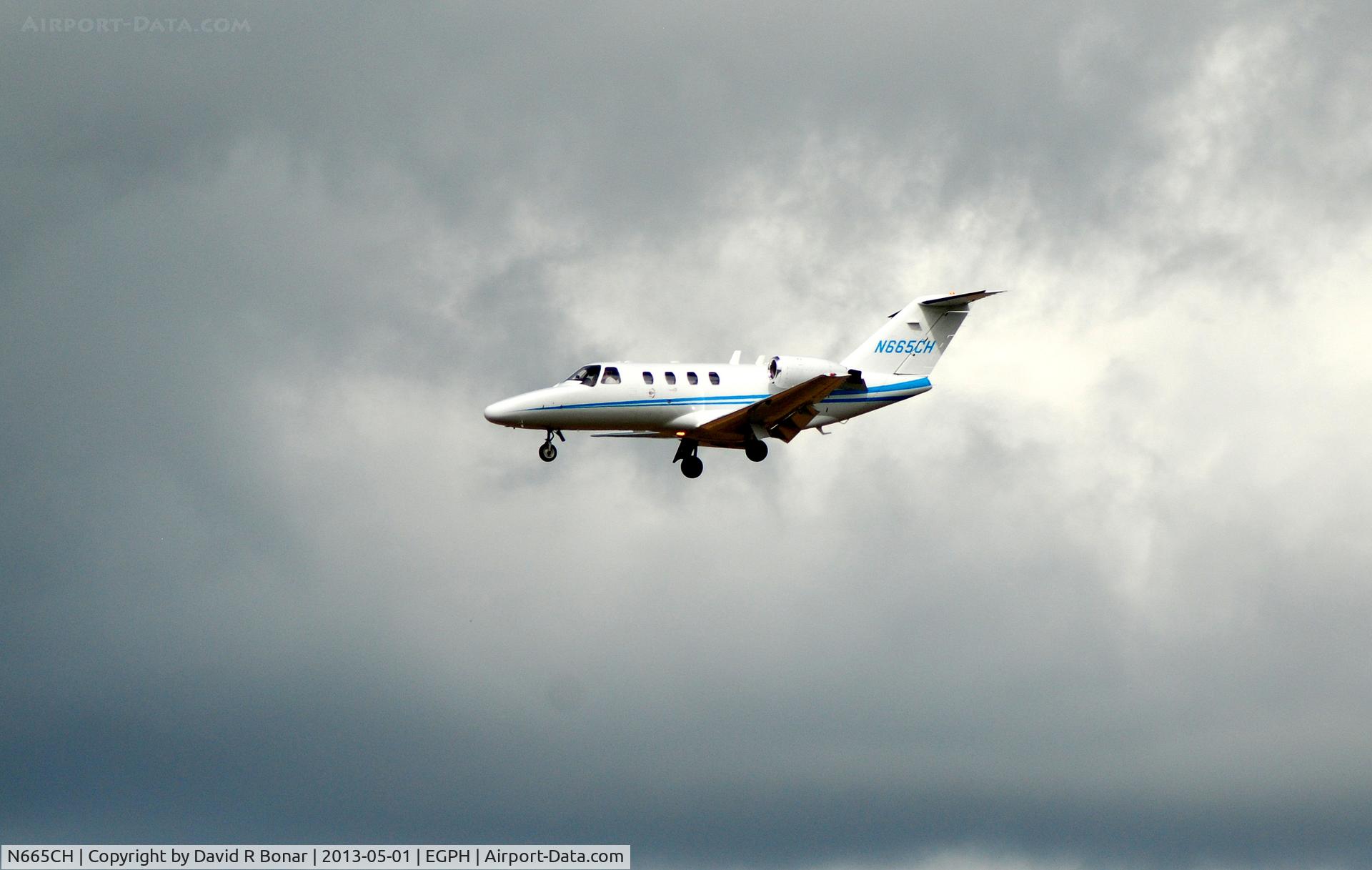 N665CH, 2002 Cessna 525 CitationJet CJ1 C/N 525-0504, Running before the Storm...on short finals.