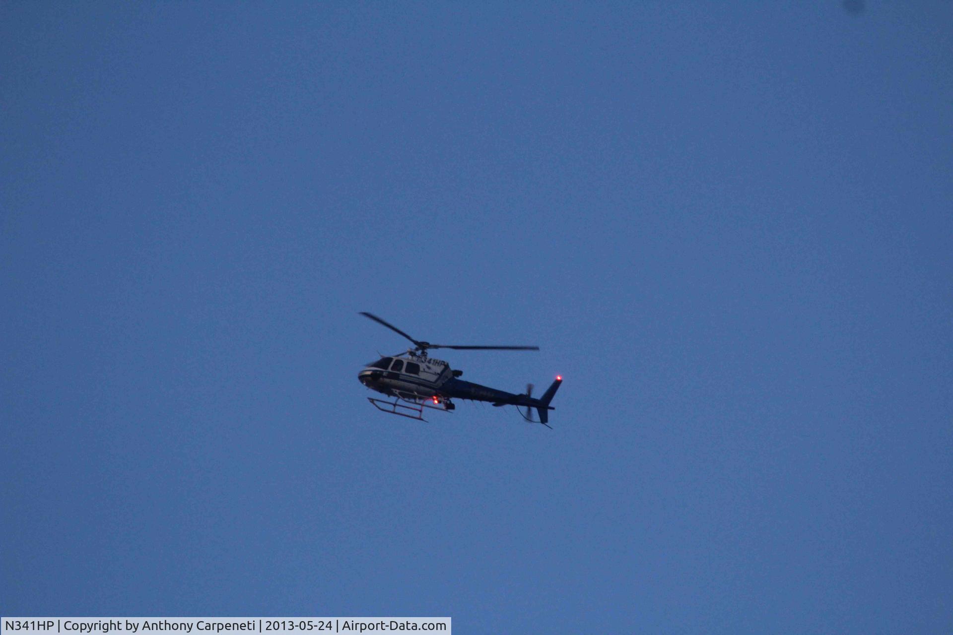N341HP, 2001 Eurocopter AS-350B-3 Ecureuil Ecureuil C/N 3407, N341HP overflying AT&T Park in San Francisco, CA. What it was doing, I have no clue, but I bet the pilot wanted the score of the game.