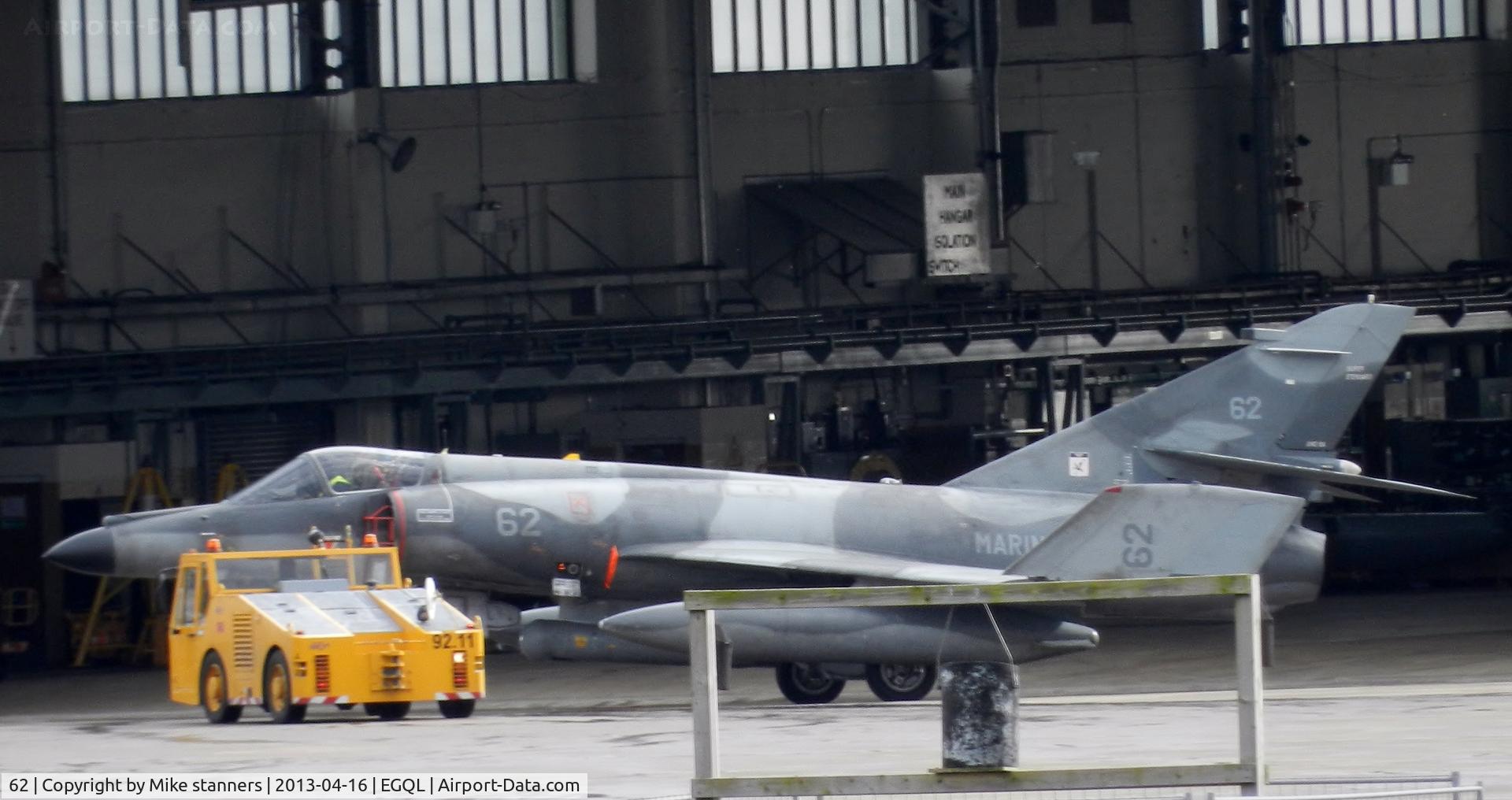62, Dassault Super Etendard C/N 76, 17F Super Etendard 	62,c/n 76
being pushed into the hanger after the day's flying was cancelled due to 40mph cross winds