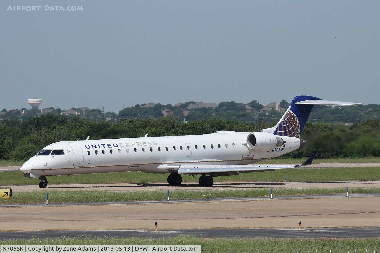 N705SK, 2004 Bombardier CRJ-701 (CL-600-2C10) Regional Jet C/N 10145, United at DFW Airport