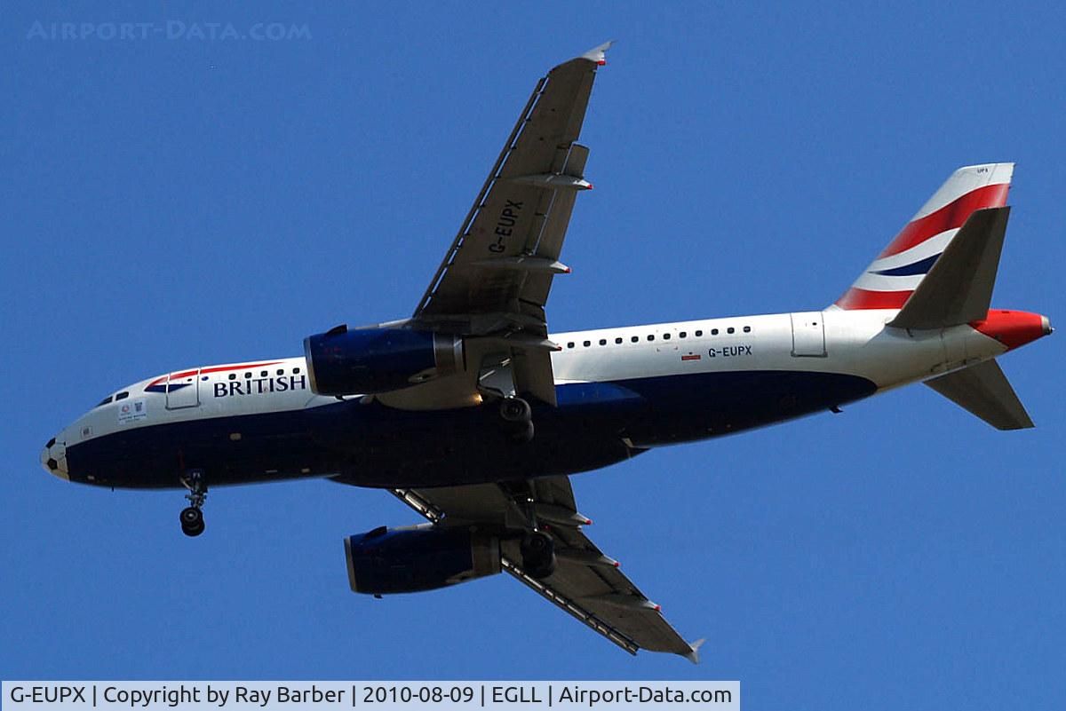 G-EUPX, 2001 Airbus A319-131 C/N 1445, Airbus A319-131 [1445] (British Airways) Home~G 09/08/2010 On approach 27R with football colouring on nose for 2010 World Cup and 2 posters below the cockpit.