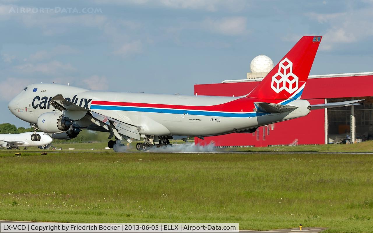 LX-VCD, 2011 Boeing 747-8R7F C/N 35809, touchdown RW06