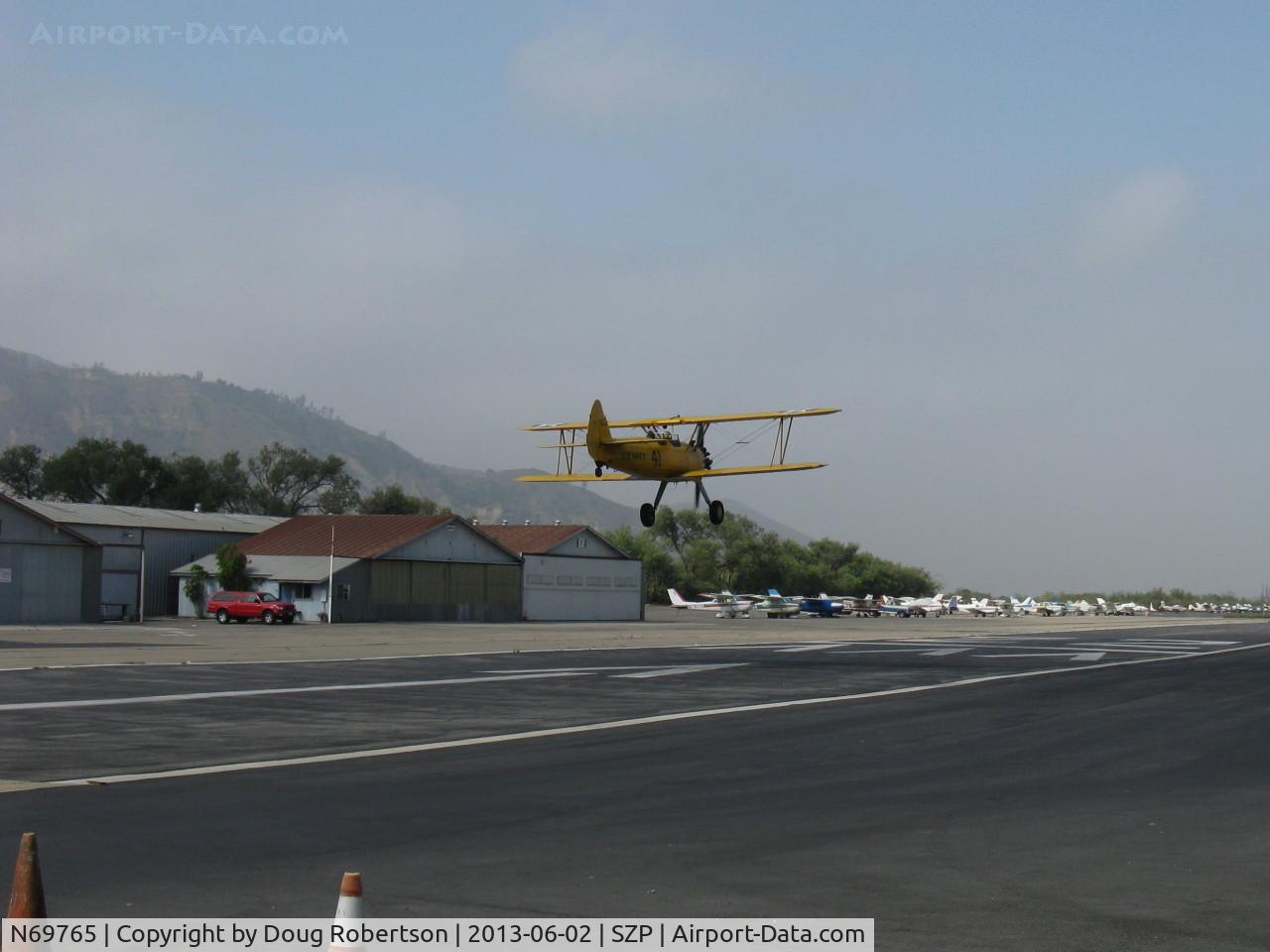 N69765, 1941 Boeing A75N1 (PT17) C/N 75-1044, 1941 Boeing Stearman A75N1 as Navy N2S-1, Continental W670 220 Hp, on final Rwy 22