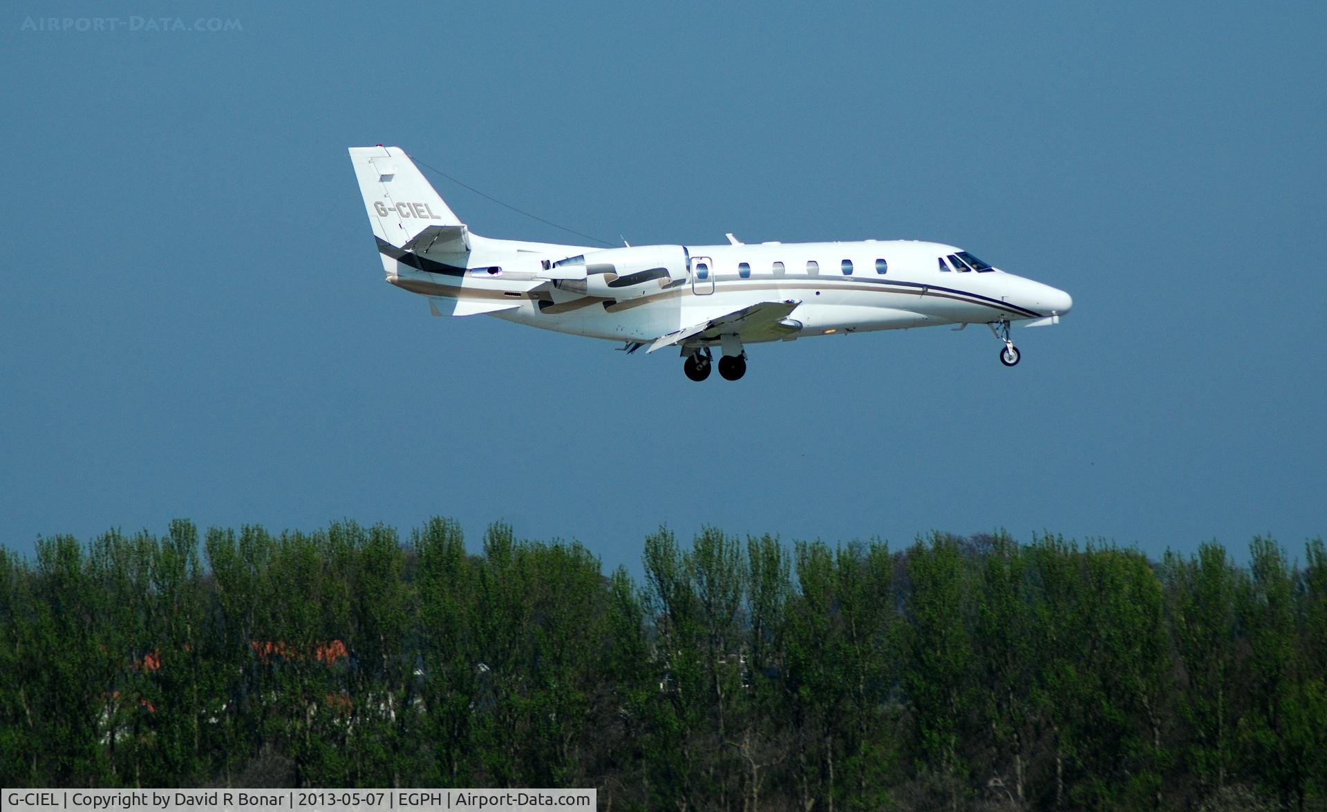 G-CIEL, 2002 Cessna 560XL Citation Excel C/N 560-5247, Short finals for a 06 arrival. Inbound from london