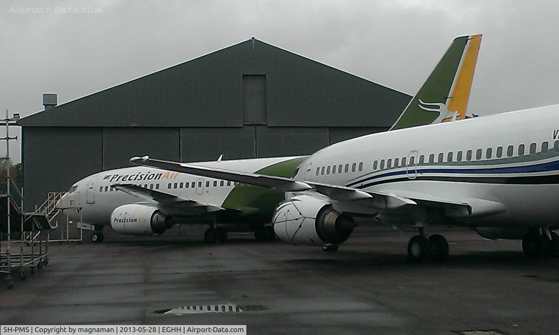 5H-PMS, 1999 Boeing 737-36N C/N 28596, In amongst a load of 737's at Hurn - 737 and biz jet wonderland for the south coast!