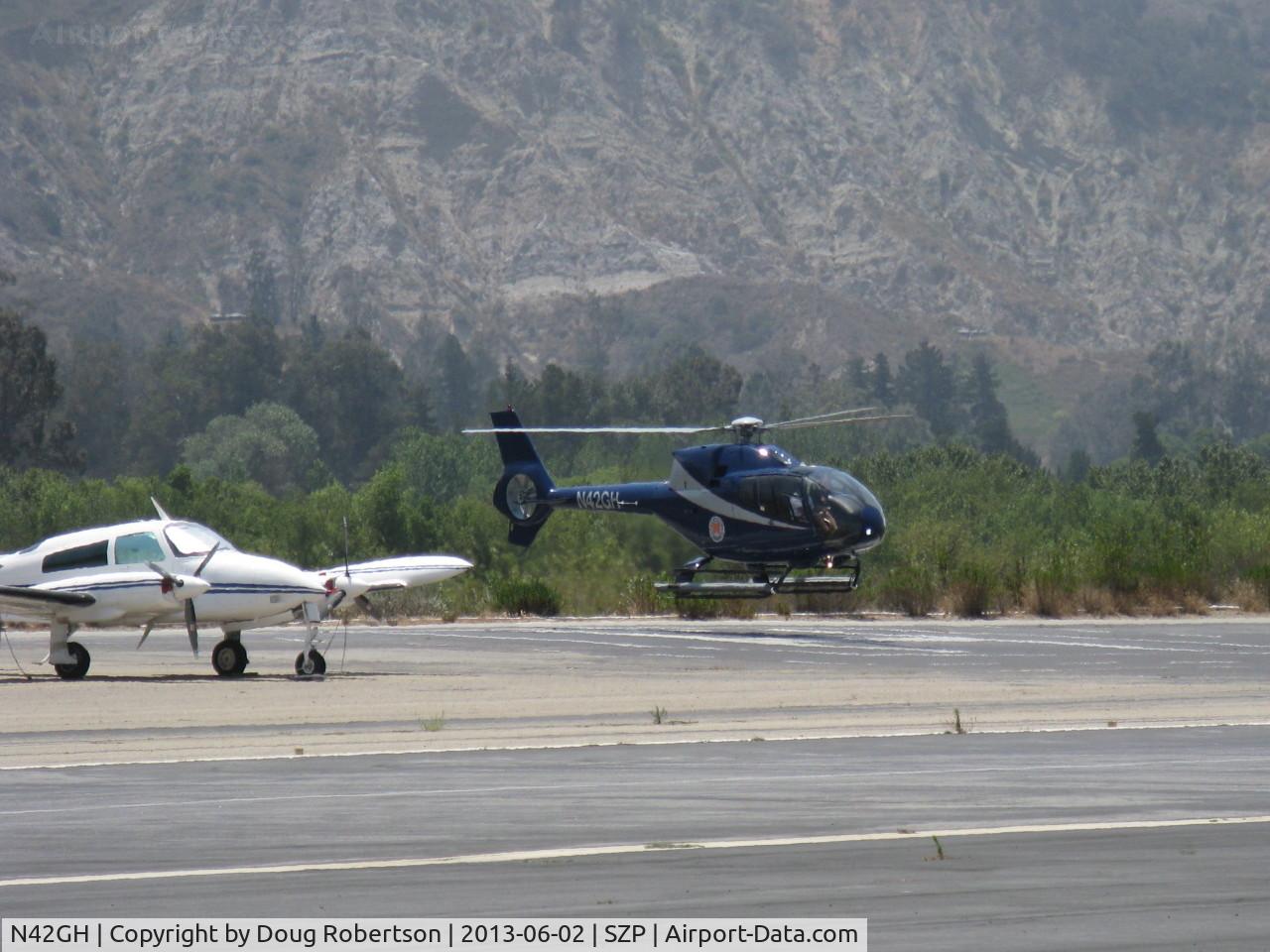 N42GH, Eurocopter EC-120B Colibri C/N 1093, 2000 Eurocopter EC-120B COLIBRI 'Hummingbird', one Turbomeca TM 319 Arrius 2F Turboshaft 504 shp, a notably quiet helicopter, liftoff hover from SZP Helipad prior to departure