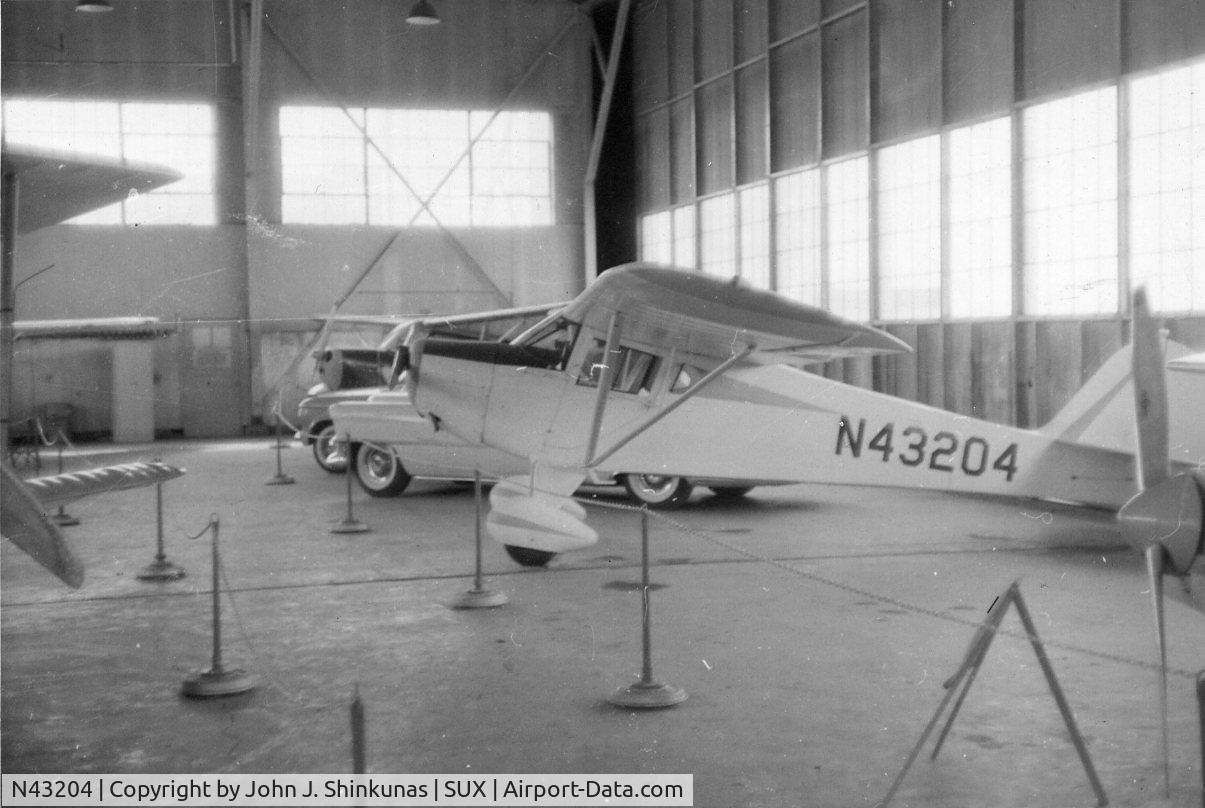 N43204, 1946 Taylorcraft BC12-D C/N 6863, Photographed around 1964, in a hangar located at the Sioux City Municipal Airport (now Sioux Gateway Airport, Sioux City, Ia.).  Believed owned at the time by Vince Burke.