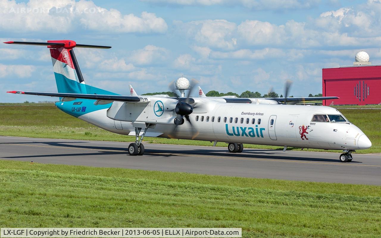 LX-LGF, 2011 De Havilland Canada DHC-8-402Q Dash 8 C/N 4349, taxying to the active