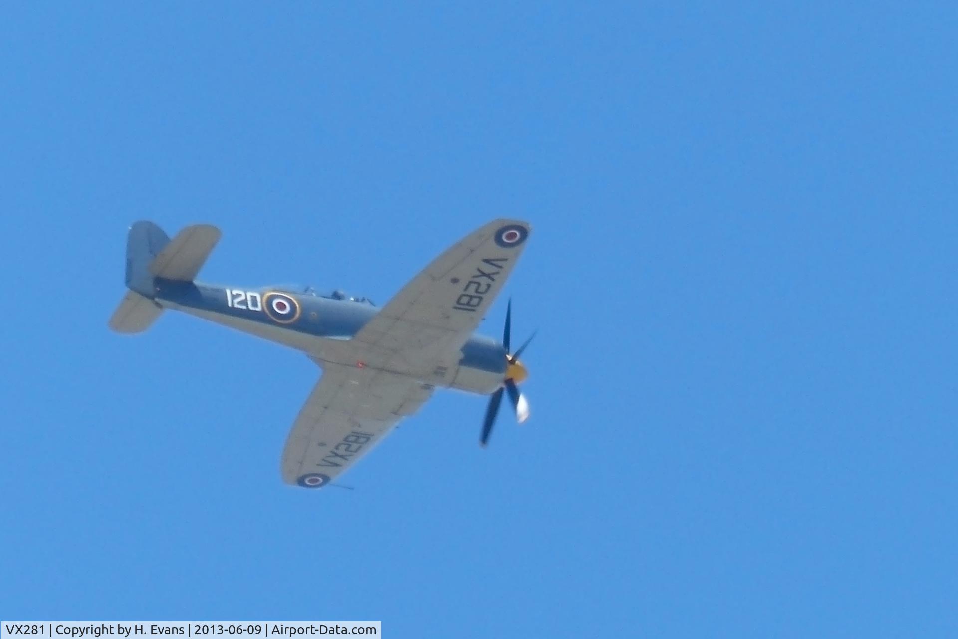 VX281, 1949 Hawker Sea Fury T.20 C/N ES.3615, Flying up the Bristol Channel, 12:45 Sunday 9th June 2013. Taken from Weston-super-Mare beach with Lumix FZ200 bridge camera.