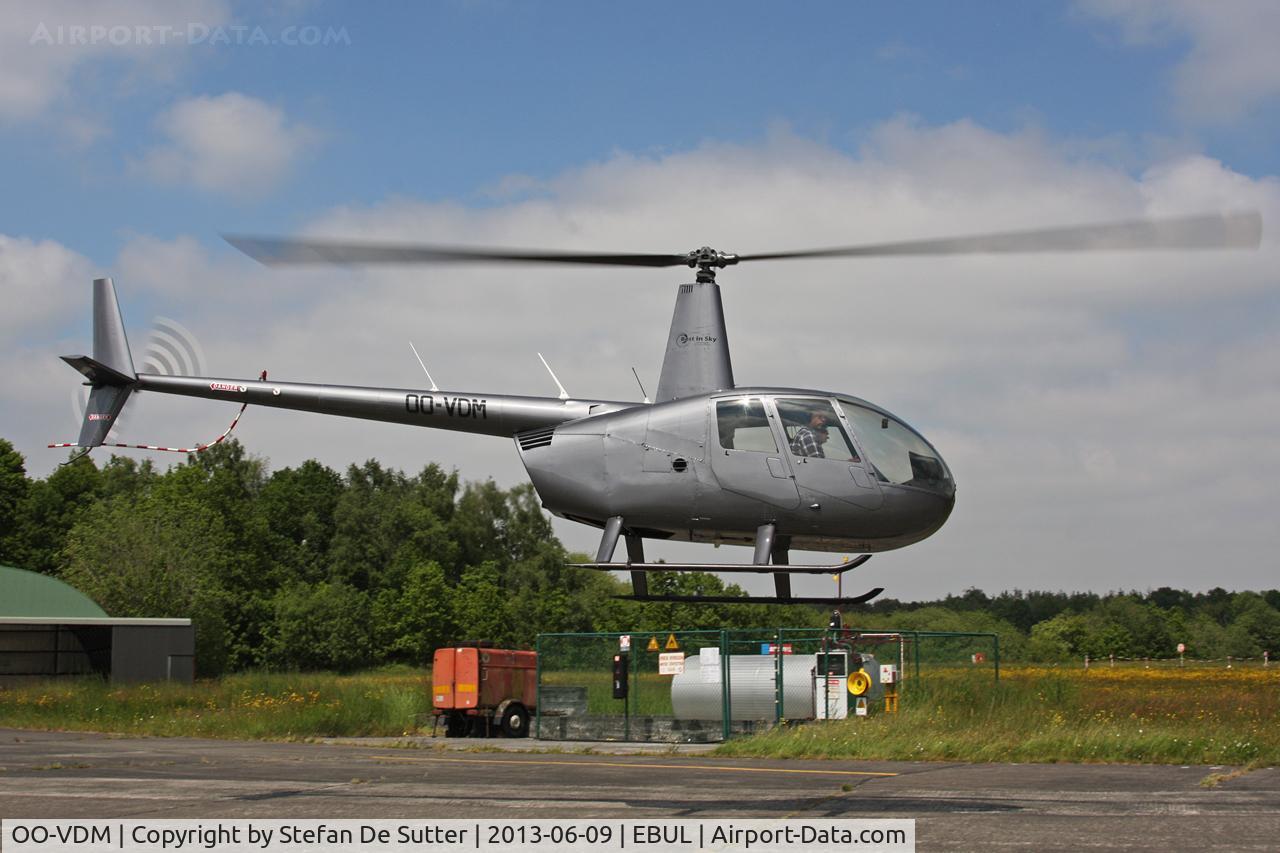 OO-VDM, 2007 Robinson R44 Raven II C/N 12063, Lifting off from Aeroclub Brugge's fuel station.