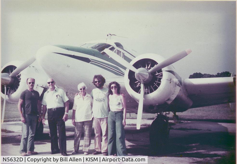 N5632D, 1958 Beech E18S C/N BA-346, My family and I had just returned from the Bahamas. Taken at Kissimmee airport about 1974. I'm second from the right.
