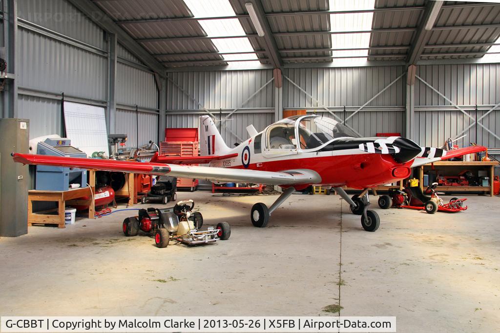 G-CBBT, 1975 Scottish Aviation Bulldog T.1 C/N BH120/344, Scottish Aviation Bulldog T.1, '695' in her hanger, surrounded by playmates. Fishburn Airfield, May 2013.