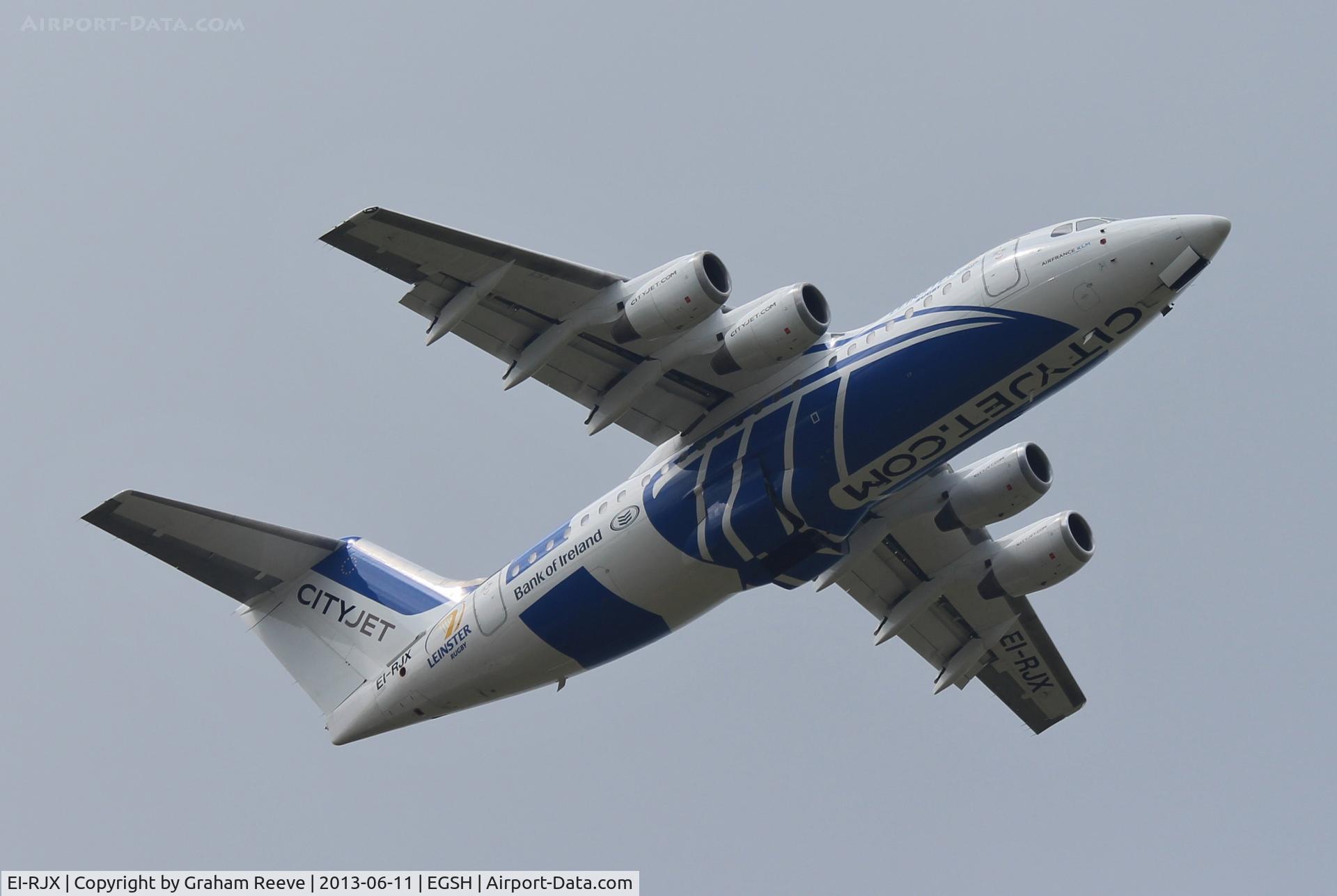 EI-RJX, 2000 BAe Systems Avro 146-RJ85A C/N E.2372, Just airbourne from runway 09.