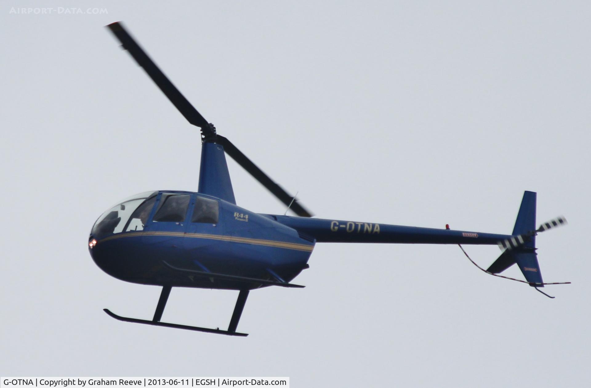 G-OTNA, 2006 Robinson R44 Raven II C/N 11092, Over head at Norwich.