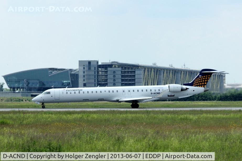 D-ACND, 2009 Bombardier CRJ-701 (CL-600-2C10) Regional Jet C/N 15238, Noon shuttle to DUS is departing on rwy 08L..